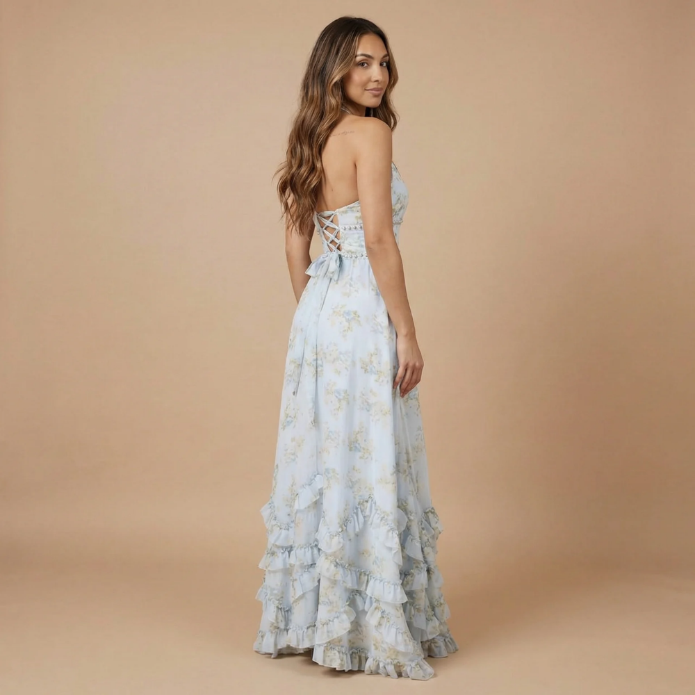 Side back view of cream floral halter dress with lace-up corset back