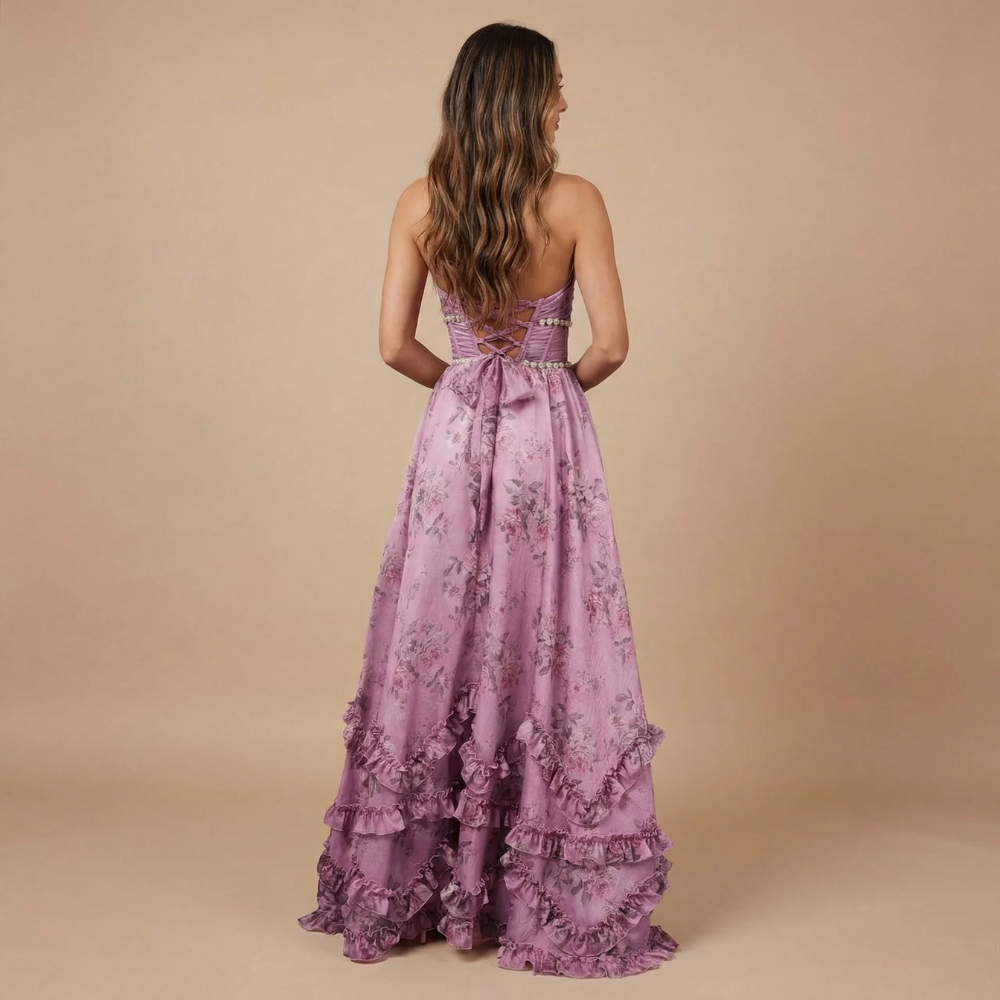 Back view of mauve purple floral halter dress with lace-up corset detail