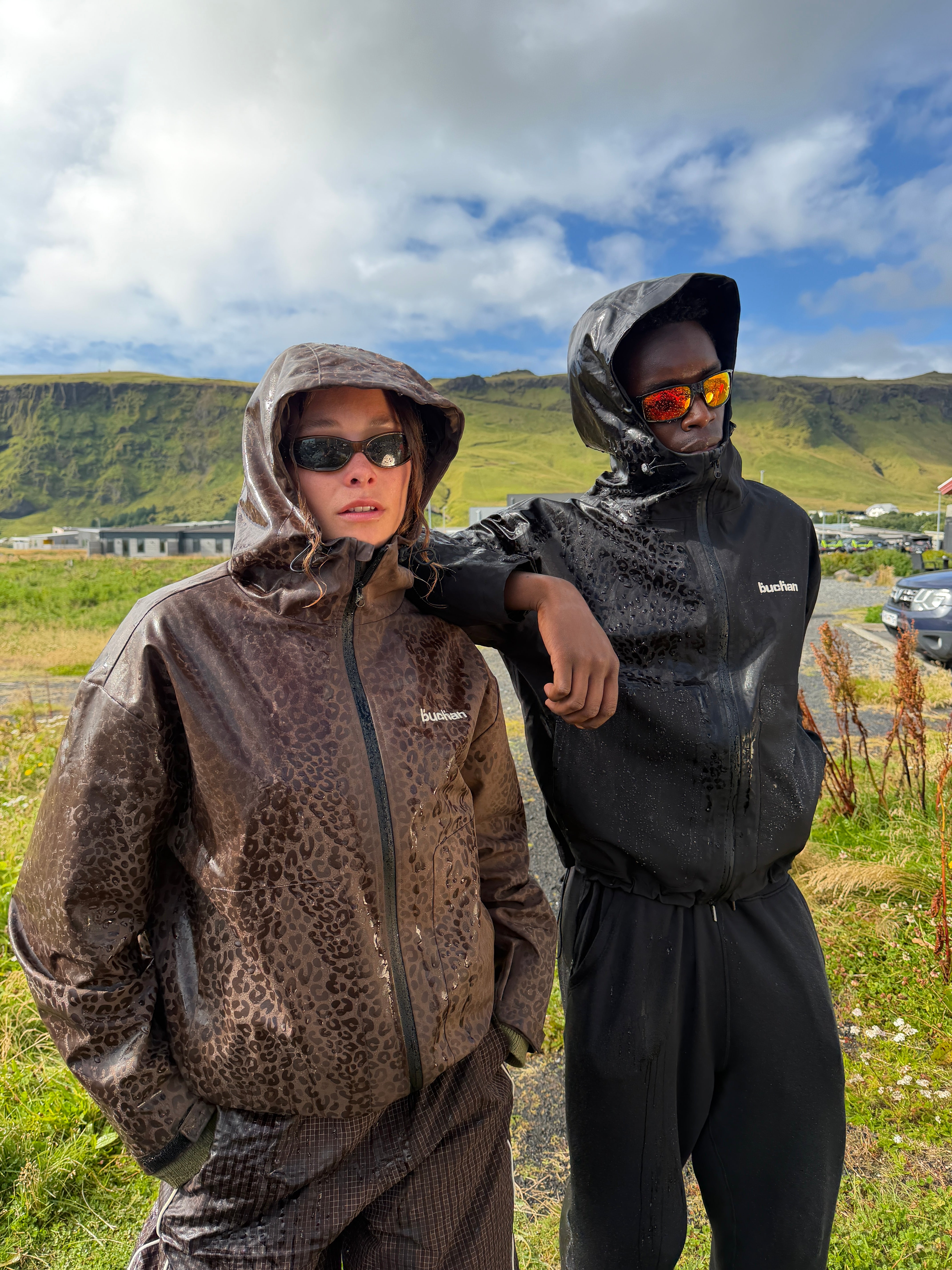 Water Reactive Cheetah Rain Jacket - Black — source media 2