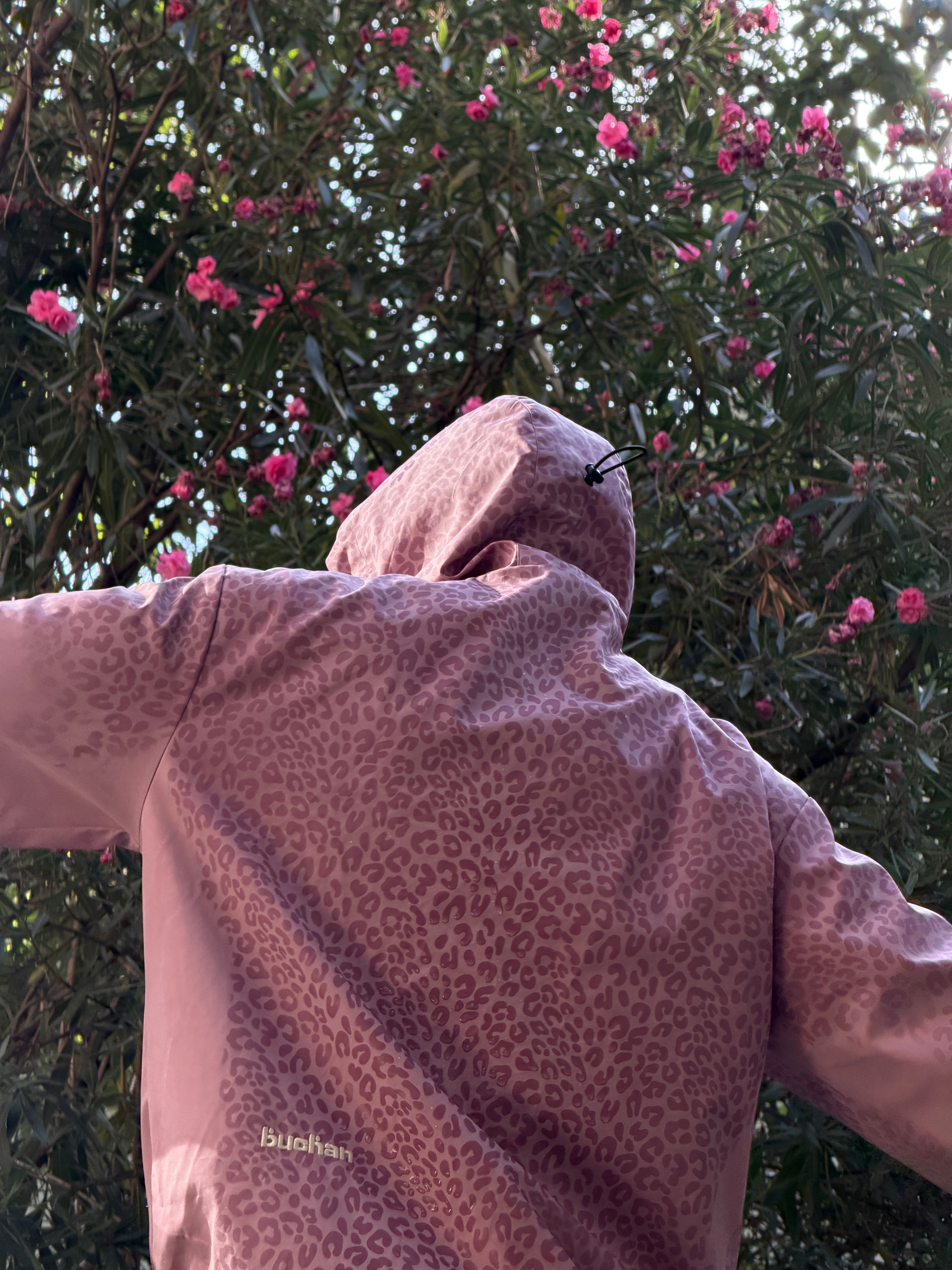 Water Reactive Cheetah Rain Jacket - Pink — source media 12