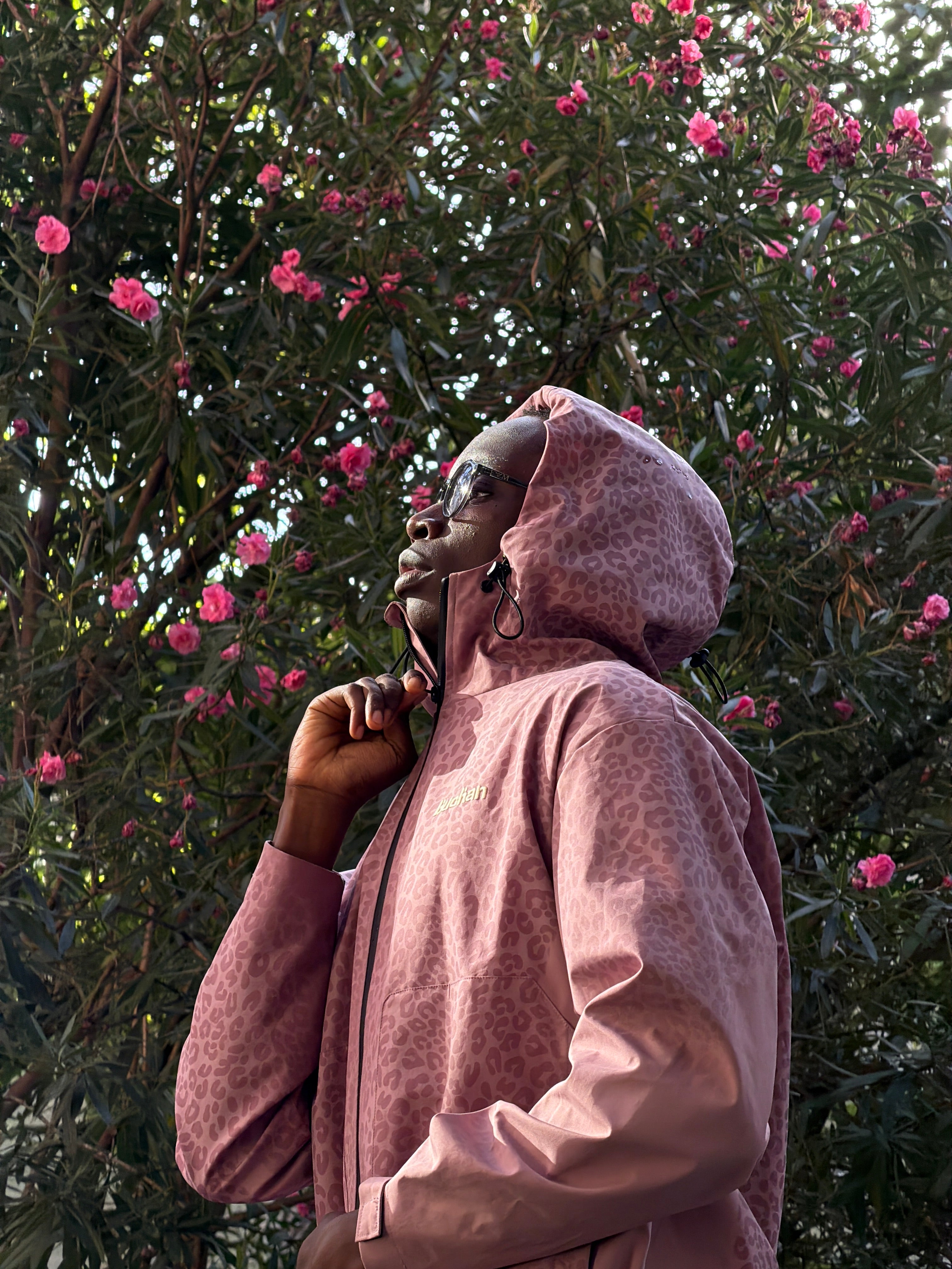 Water Reactive Cheetah Rain Jacket - Pink — source media 8