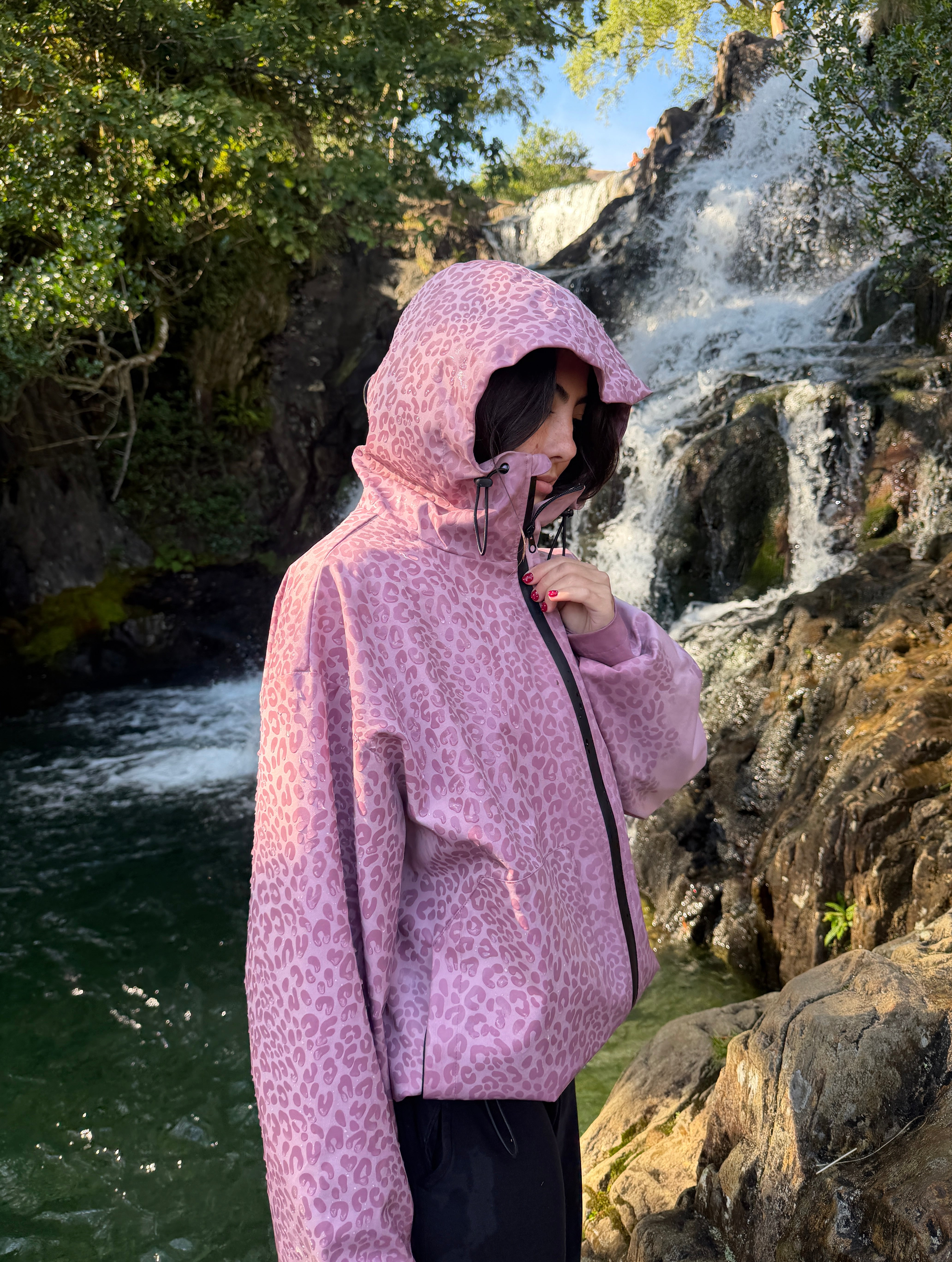 Water Reactive Cheetah Rain Jacket - Pink — source media 2