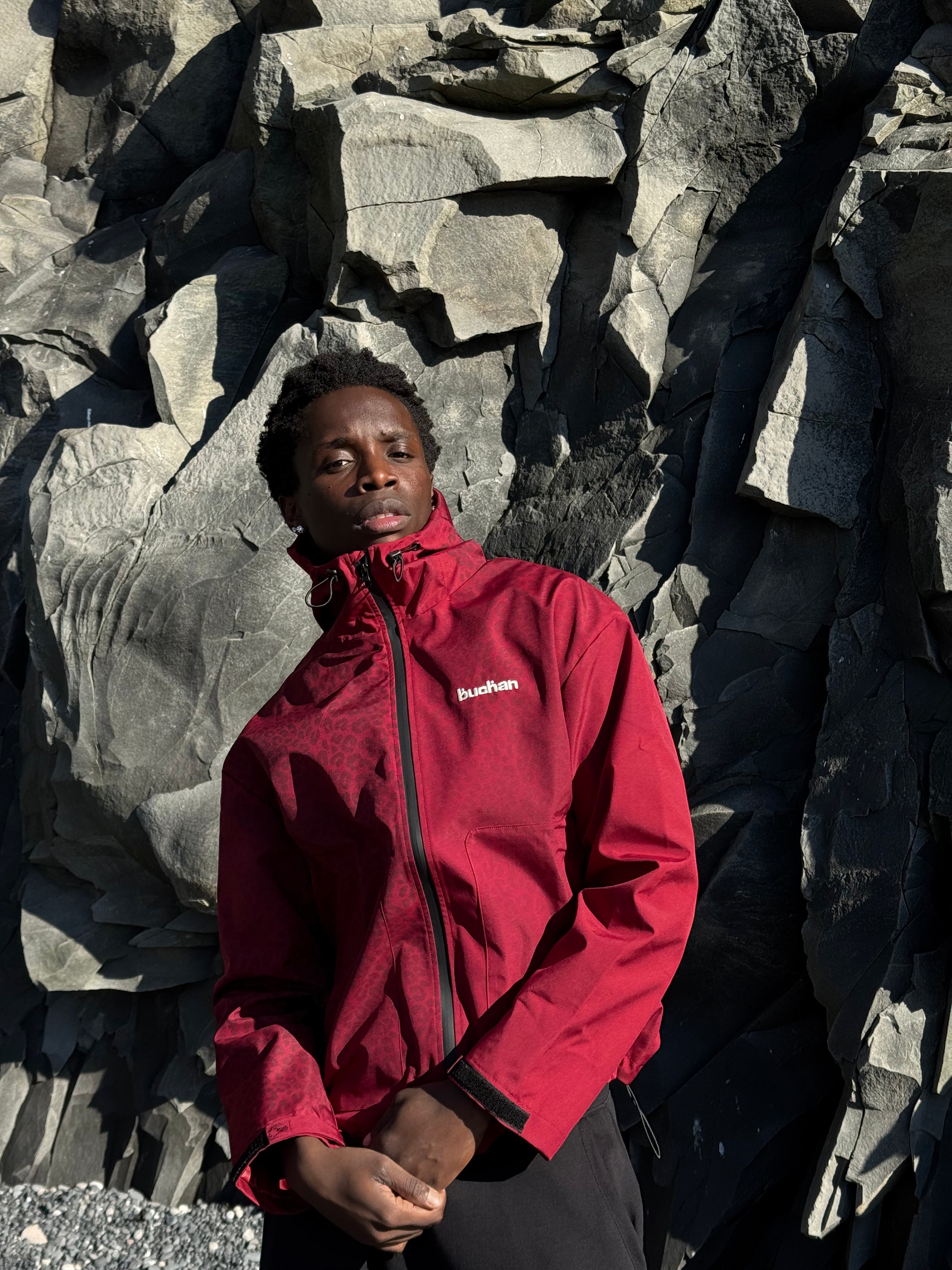 Water Reactive Cheetah Rain Jacket - Burgundy — source media 2