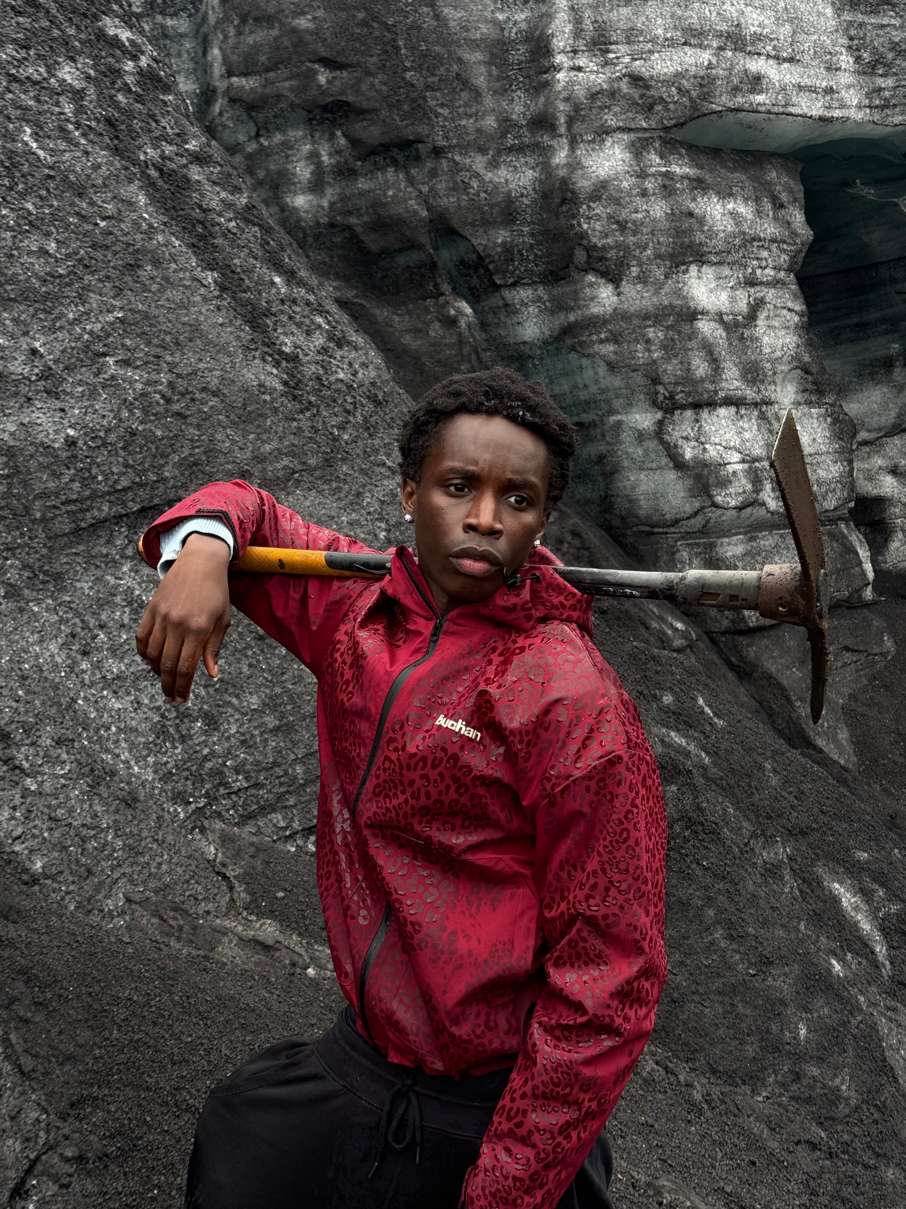 Water Reactive Cheetah Rain Jacket - Burgundy — source media 4