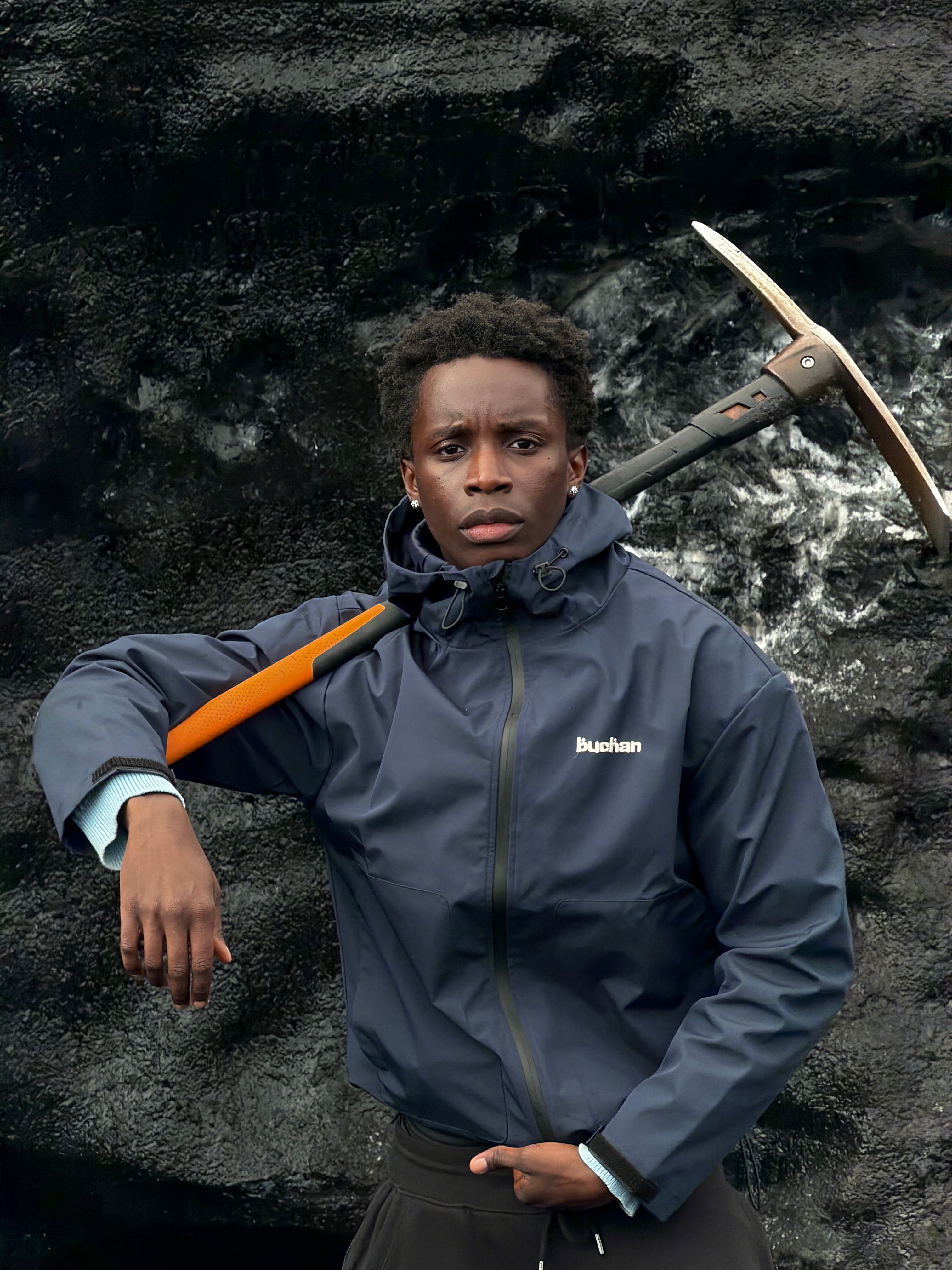 Water Reactive Cheetah Rain Jacket - Navy — source media 2