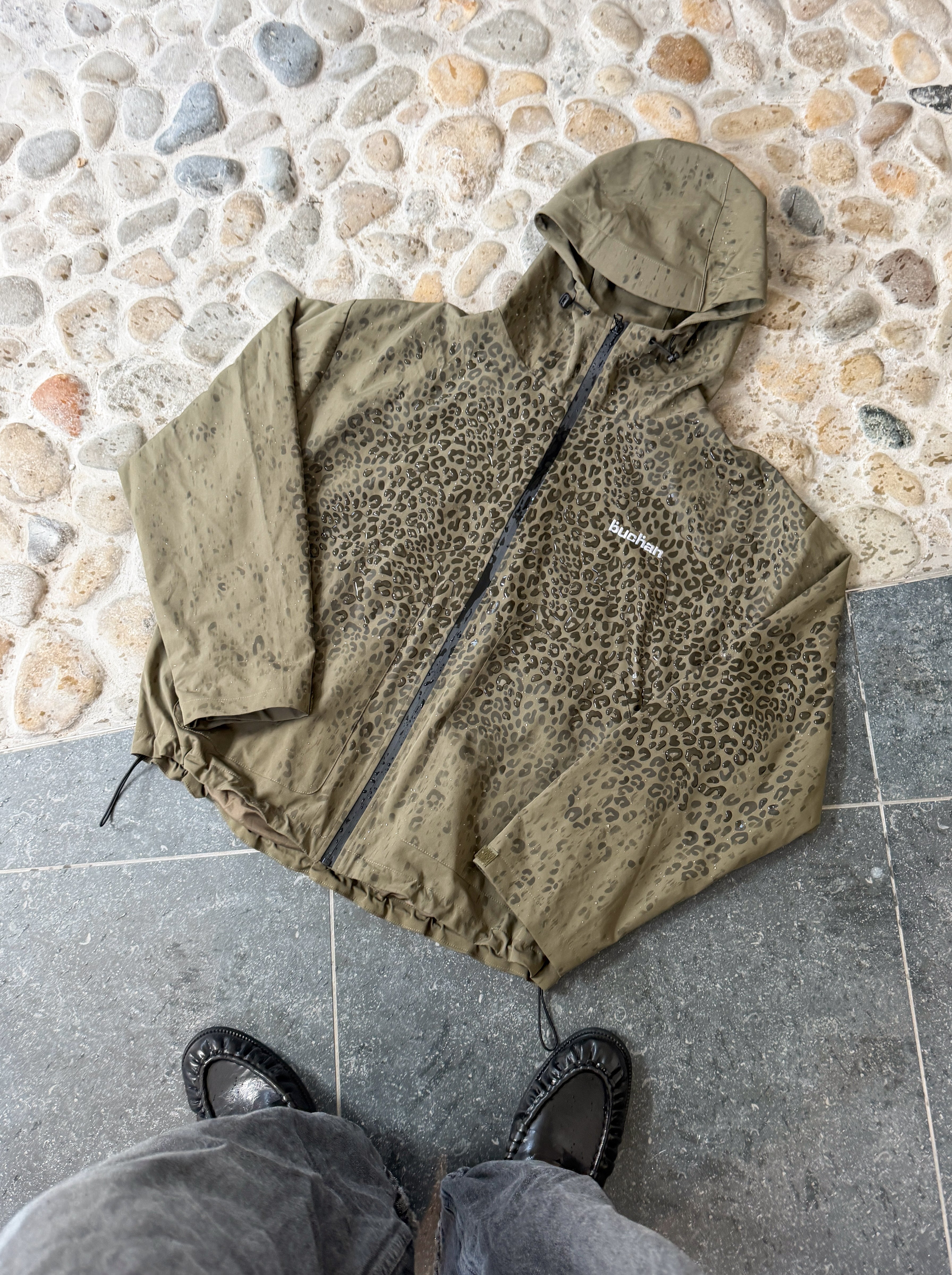 Water Reactive Cheetah Rain Jacket - Green — source media 4