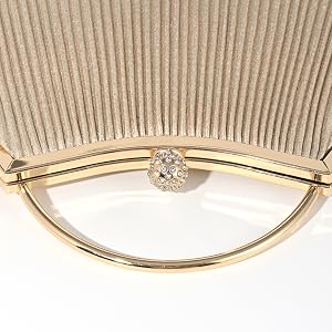 Our champagne gold clutch with high quality metal handles will get you noticed at the party!