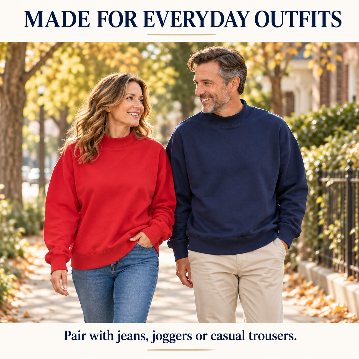 Woman and man wearing red and navy sweatshirts outdoors