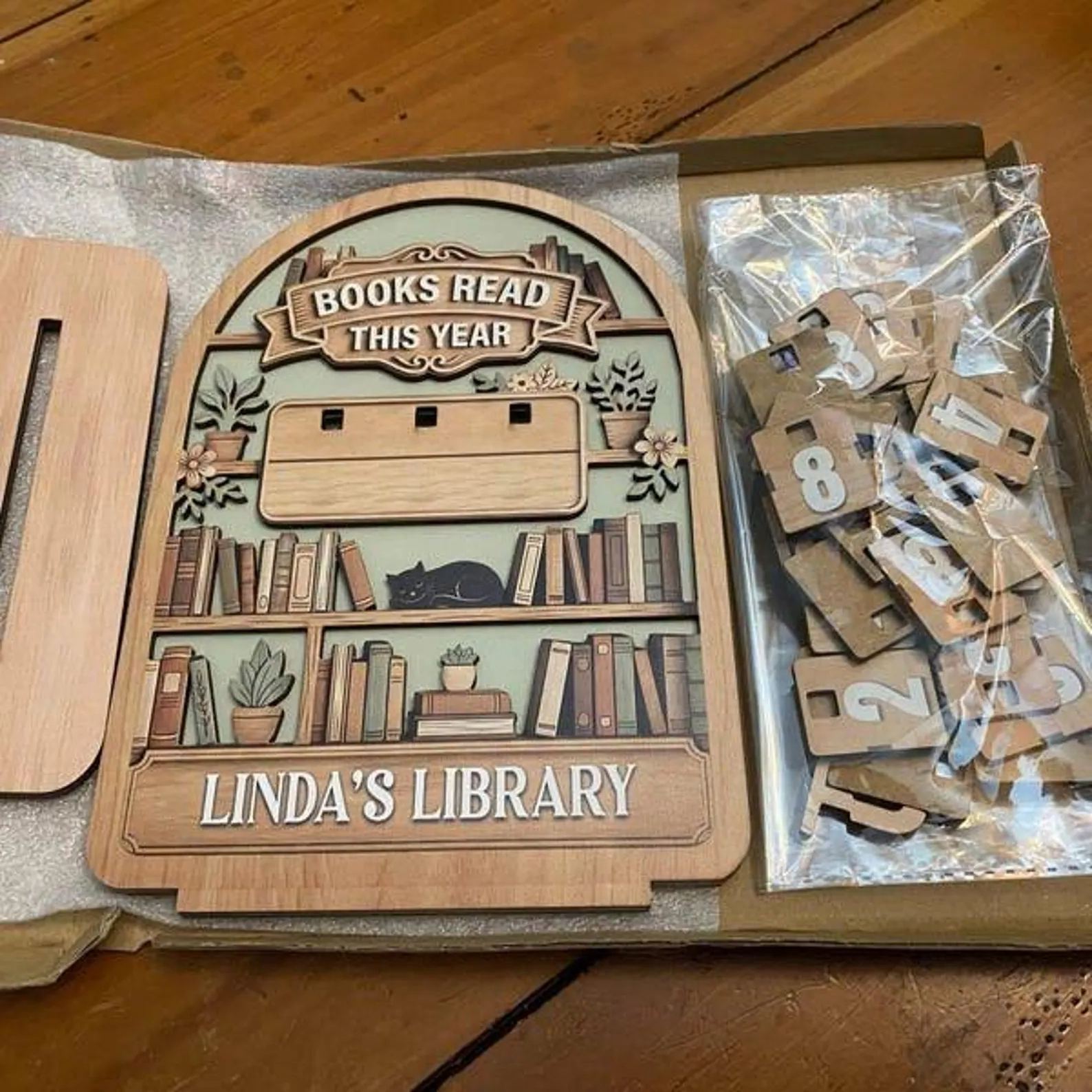 Details of the vintage wooden book tracker