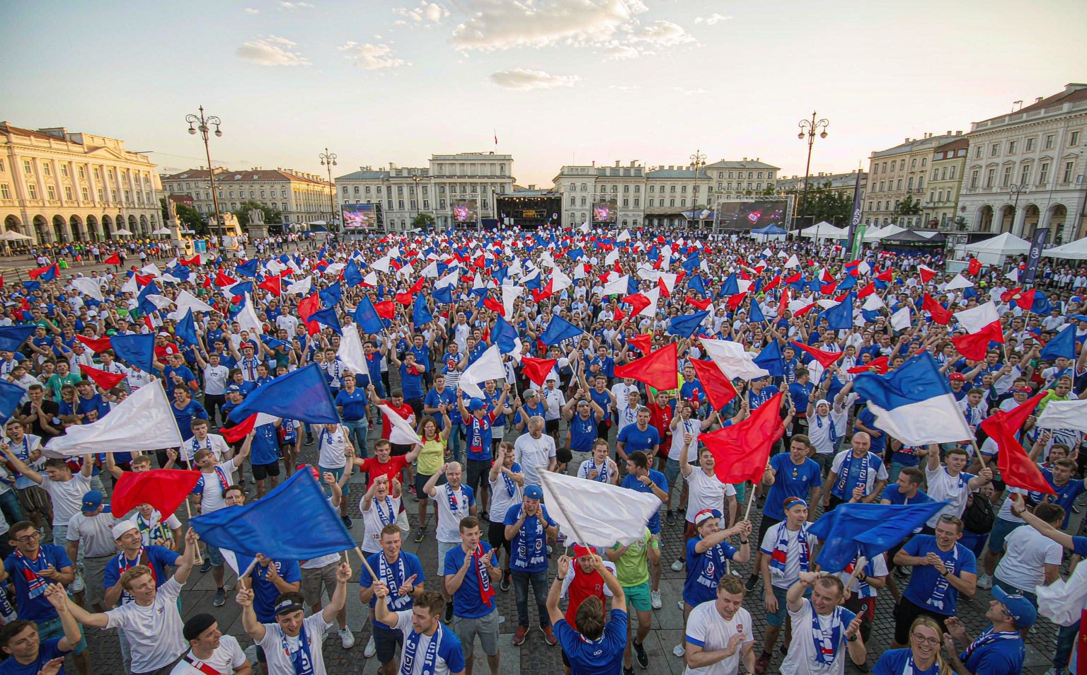 European summer football night with national colors in the stands