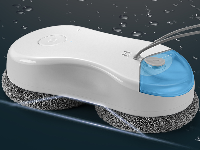 El dispositivo de limpieza blanco y azul se muestra sobre un fondo oscuro con gotas de agua, que parecen ser una herramienta para fregar o limpiar.