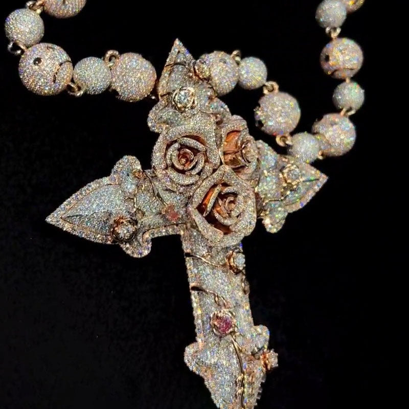 Iced out rose cross pendant necklace with gold finish and sparkling stones