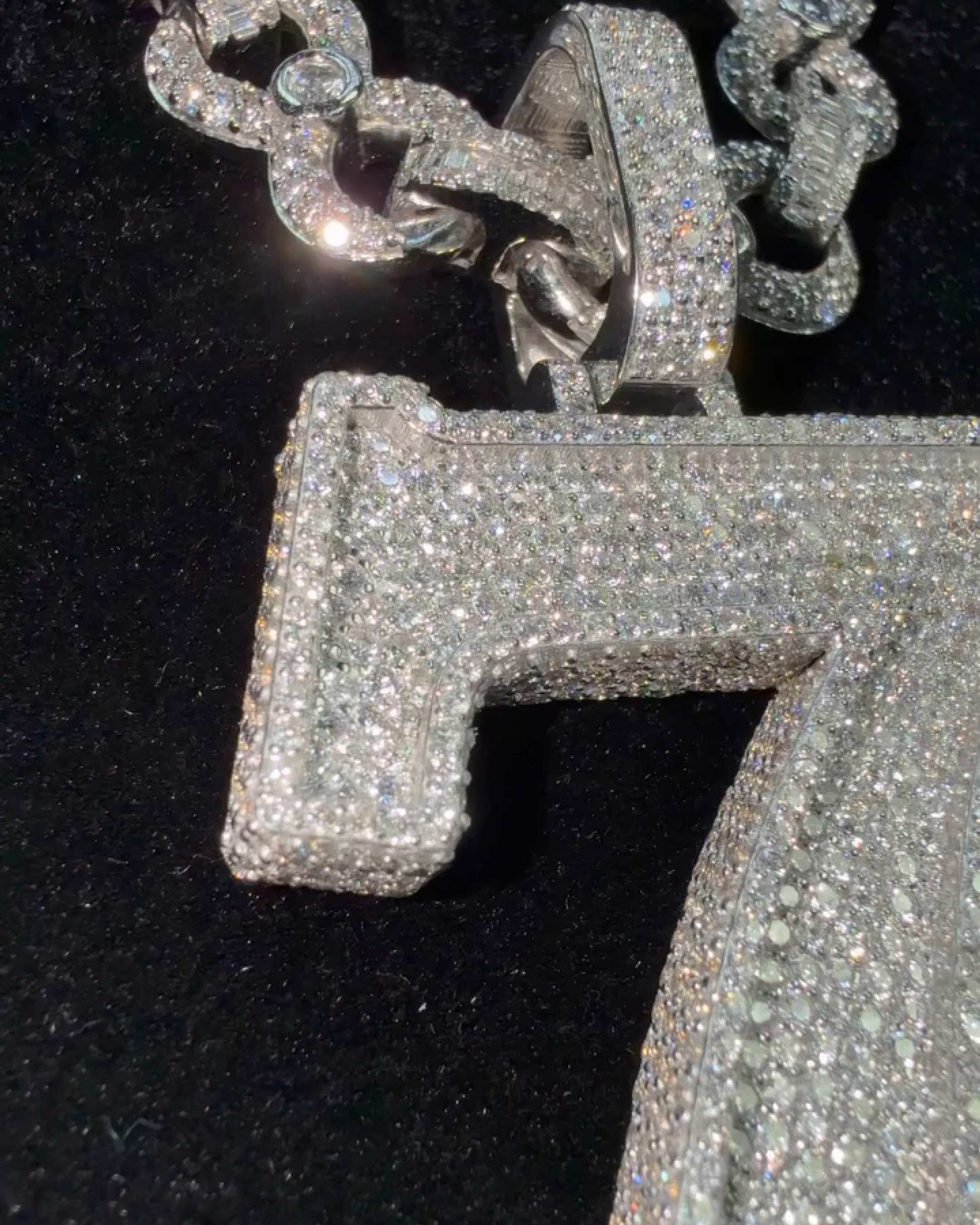 iced out 7 pendant styled with streetwear outfit