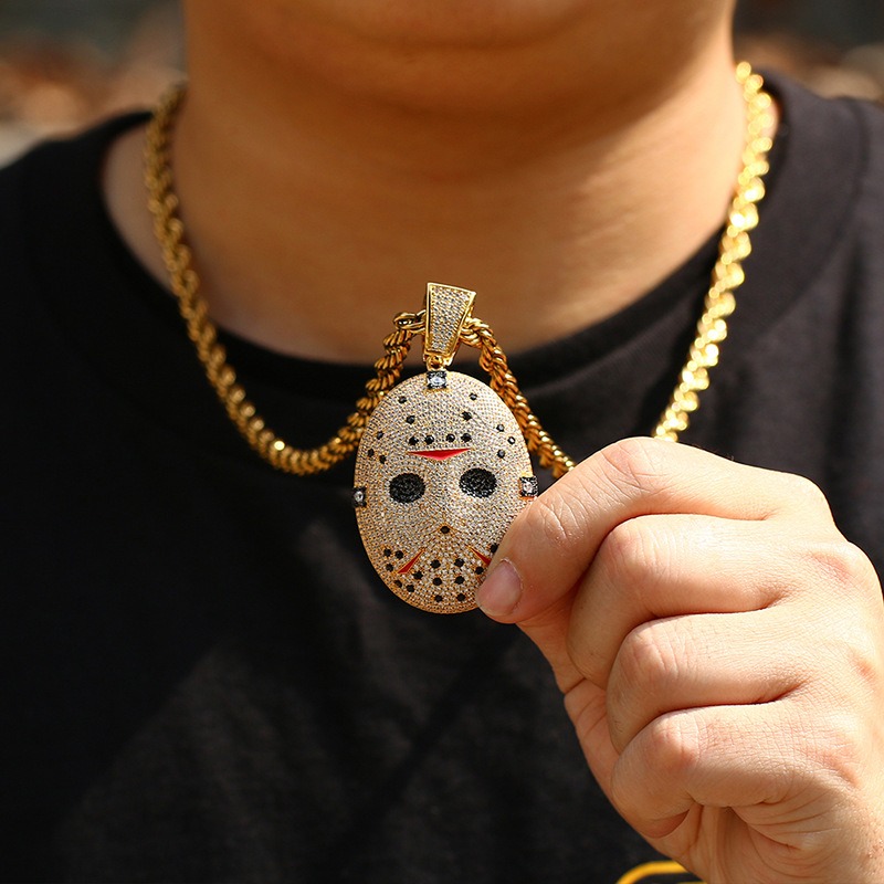 model wearing gold horror puppet style pendant streetwear fashion jewelry