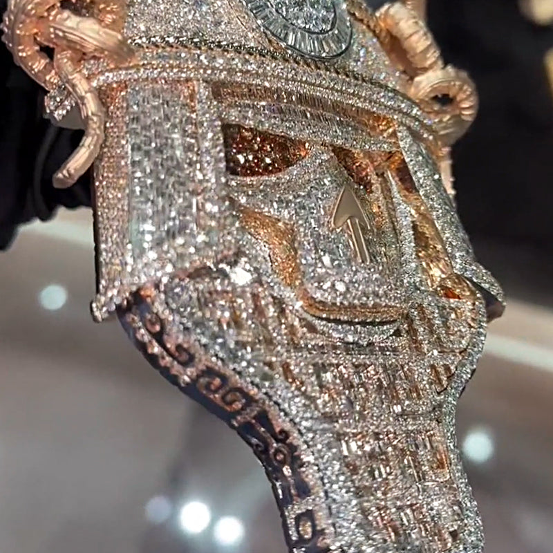 Luxury conqueror mask pendant on black background