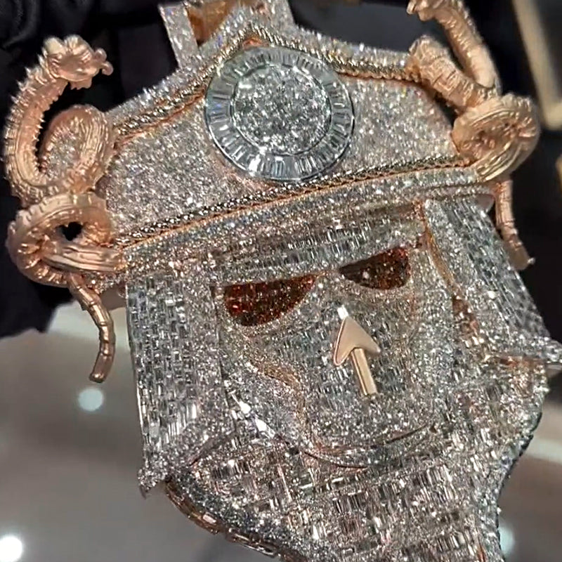 Close-up of iced out conqueror mask pendant jewelry detail