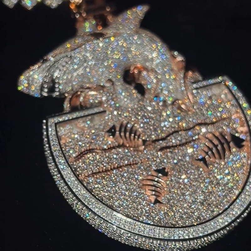 Shark pendant covered in cubic zirconia stones with rapper jewelry aesthetic