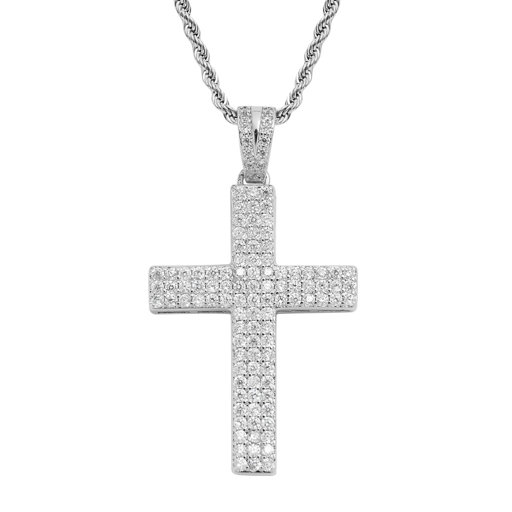 cross pendant close up stone detailing craftsmanship luxury jewelry design