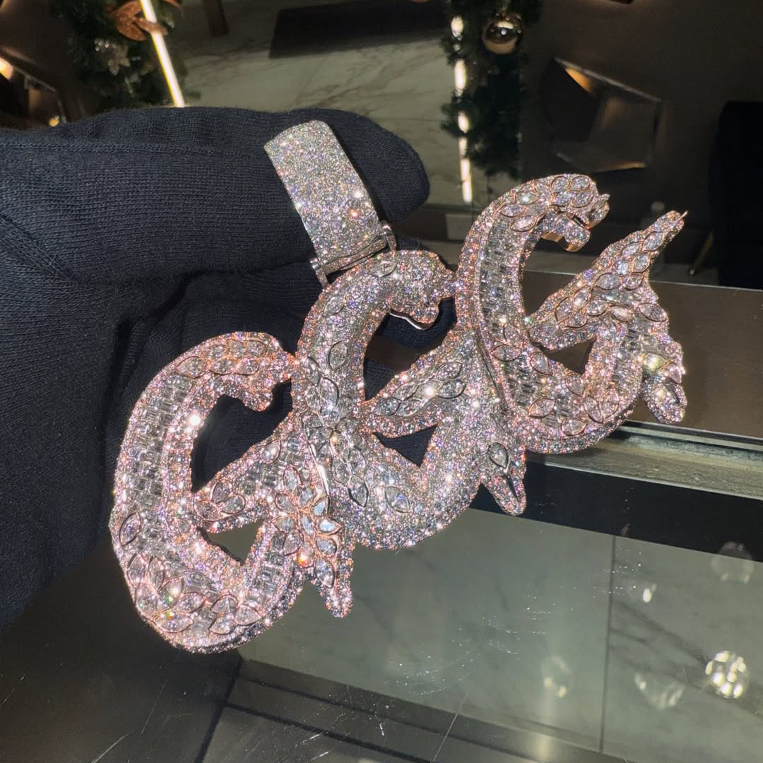 GGG letter pendant angled view luxury jewelry design detail