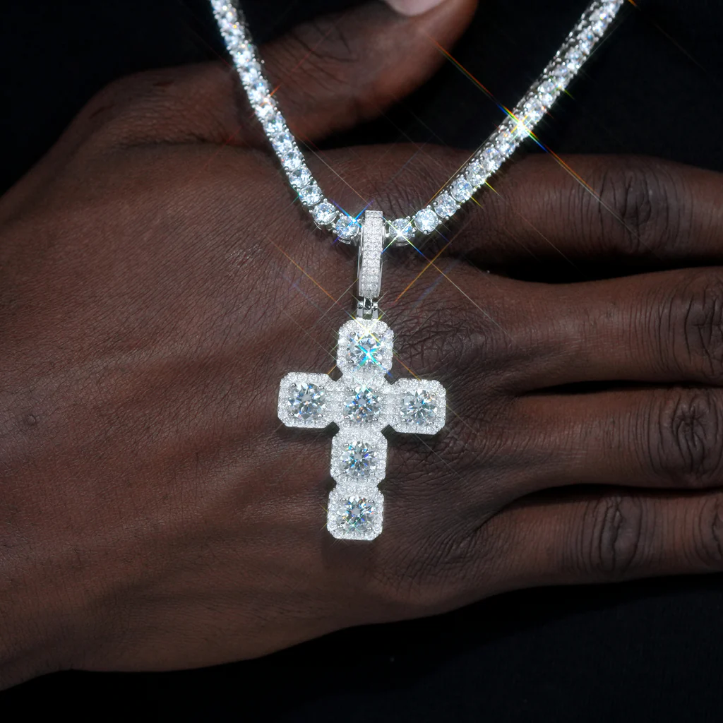 close up structured cross pendant stone details