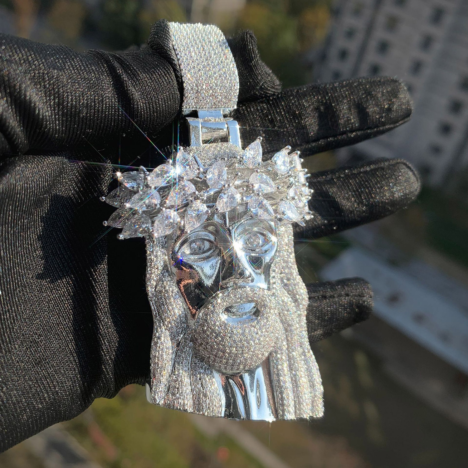 white gold Teardrop Halo Jesus pendant stone details