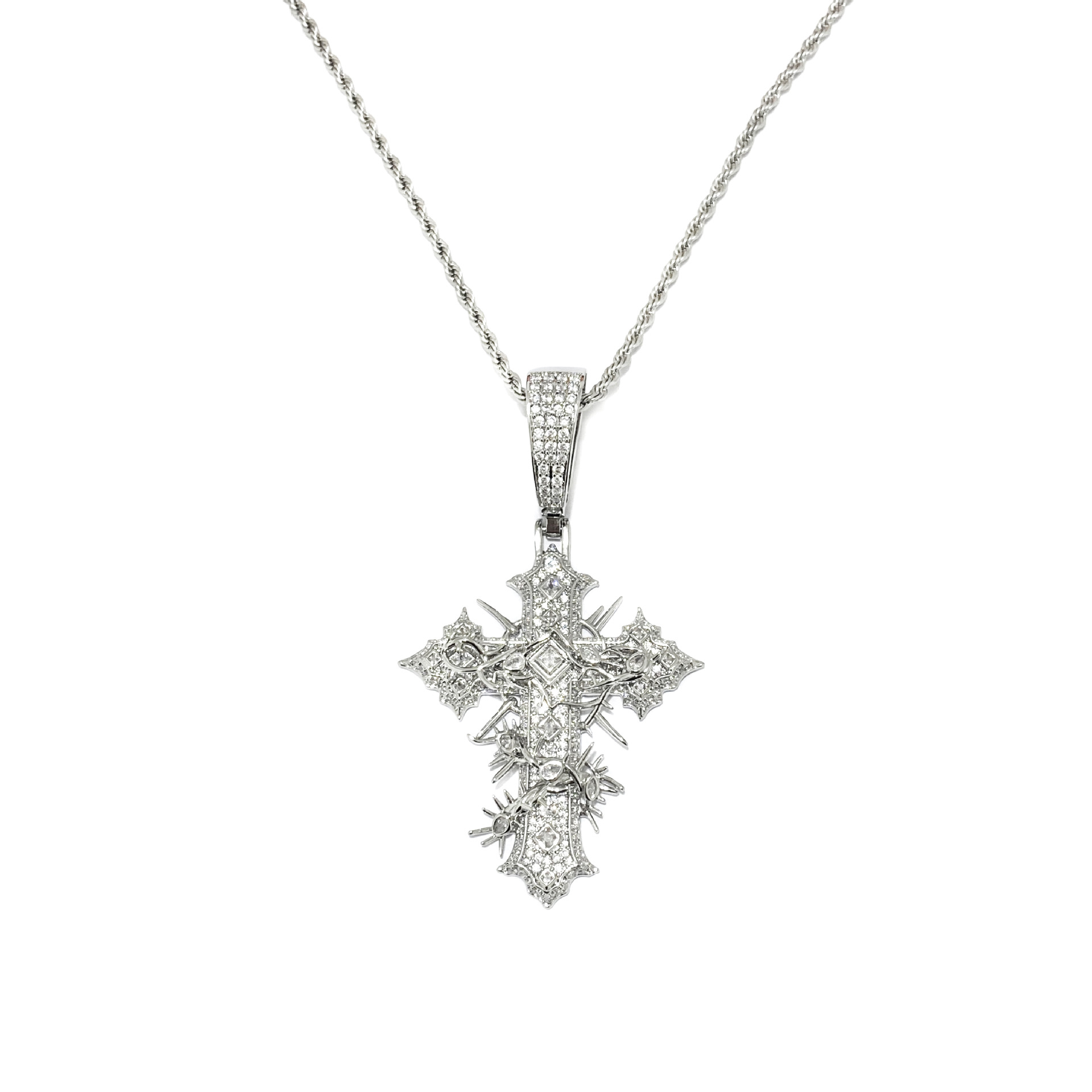 model wearing spiked cross pendant chain