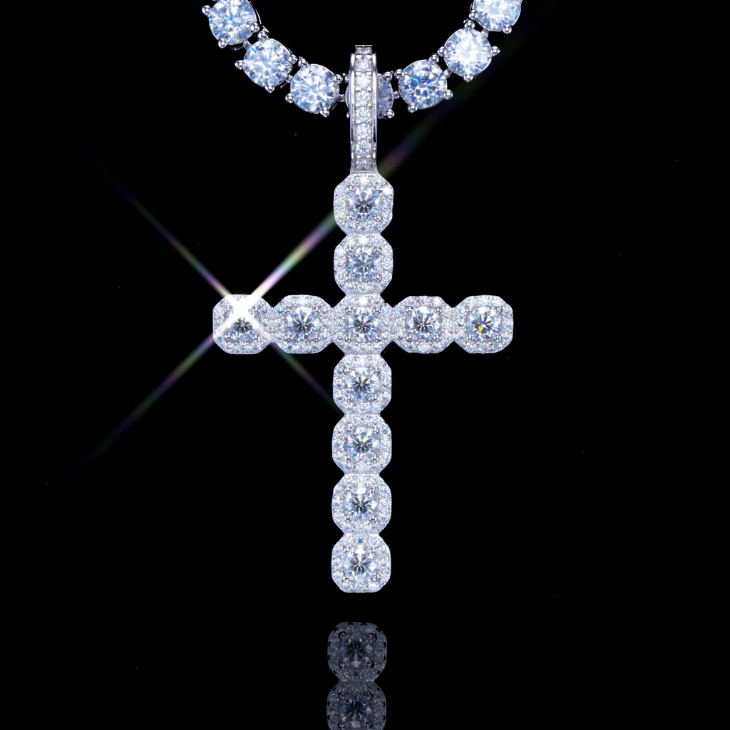 close up radiant cross pendant stone details