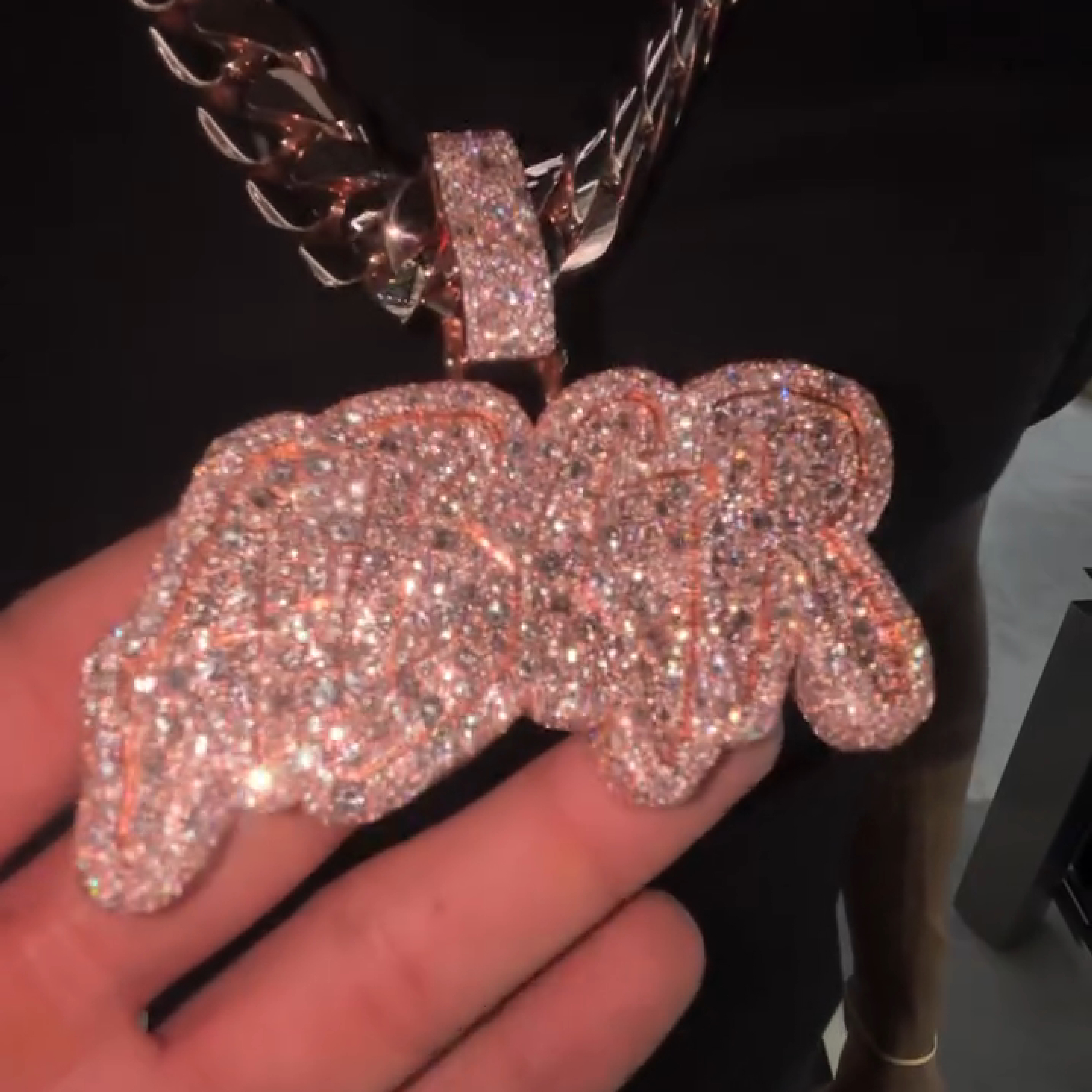 model wearing ABGR pendant layered streetwear chains