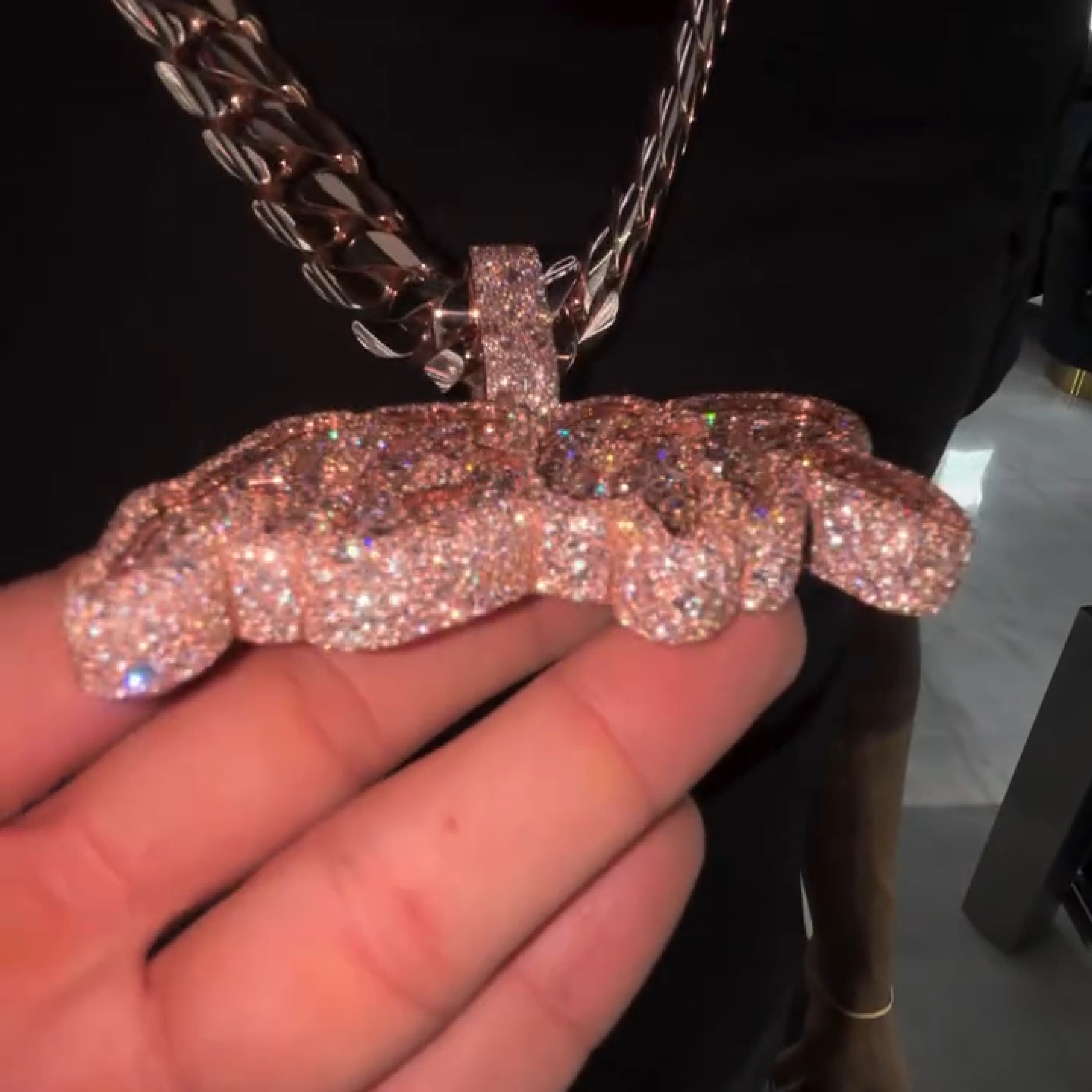 close up ABGR pendant iced out stone details
