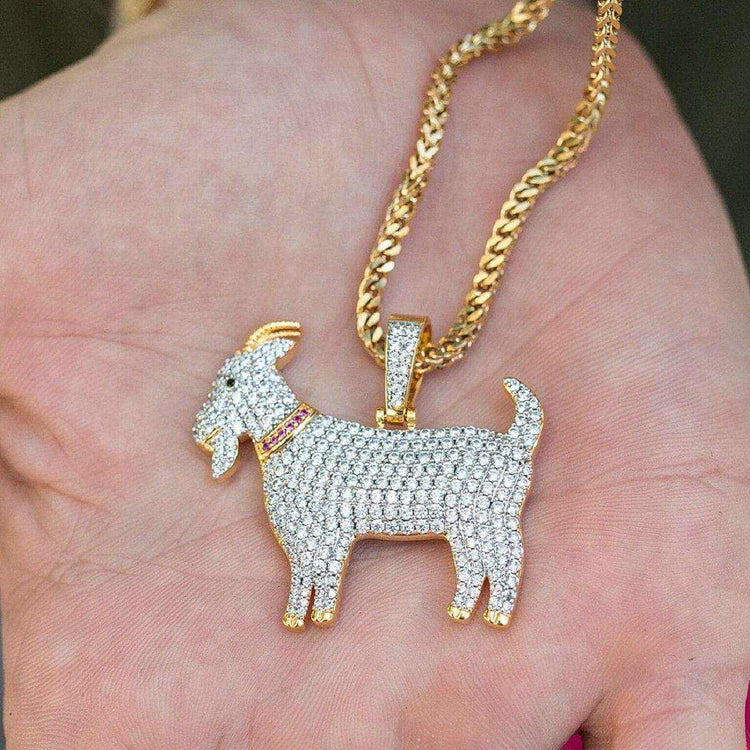 gold goat pendant close up stone detailing premium jewelry