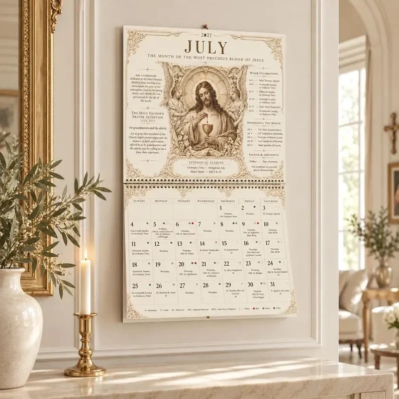2027 Catholic liturgical wall calendar hanging on a wall