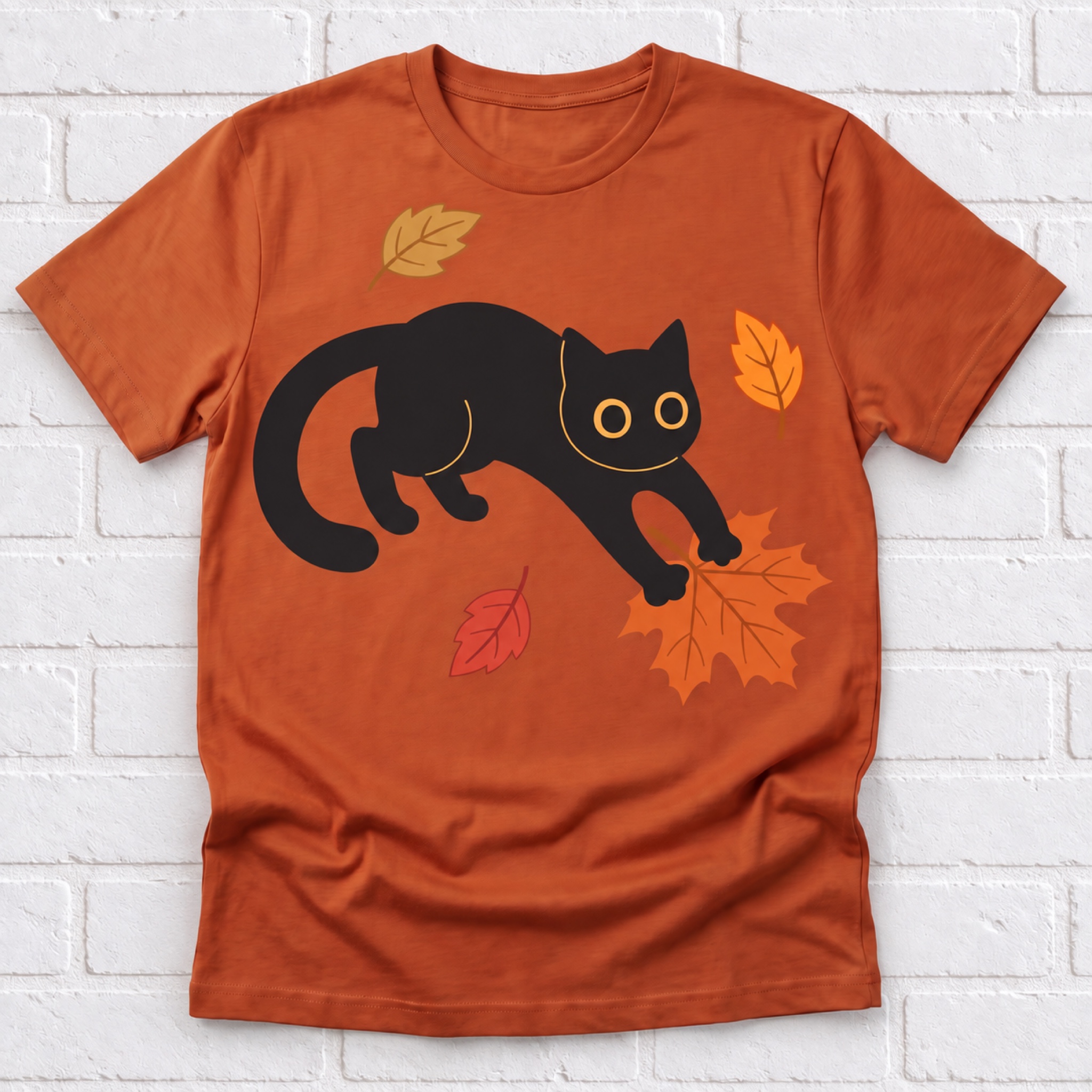 Black Cat Pouncing on Autumn Leaves Women's T-Shirt