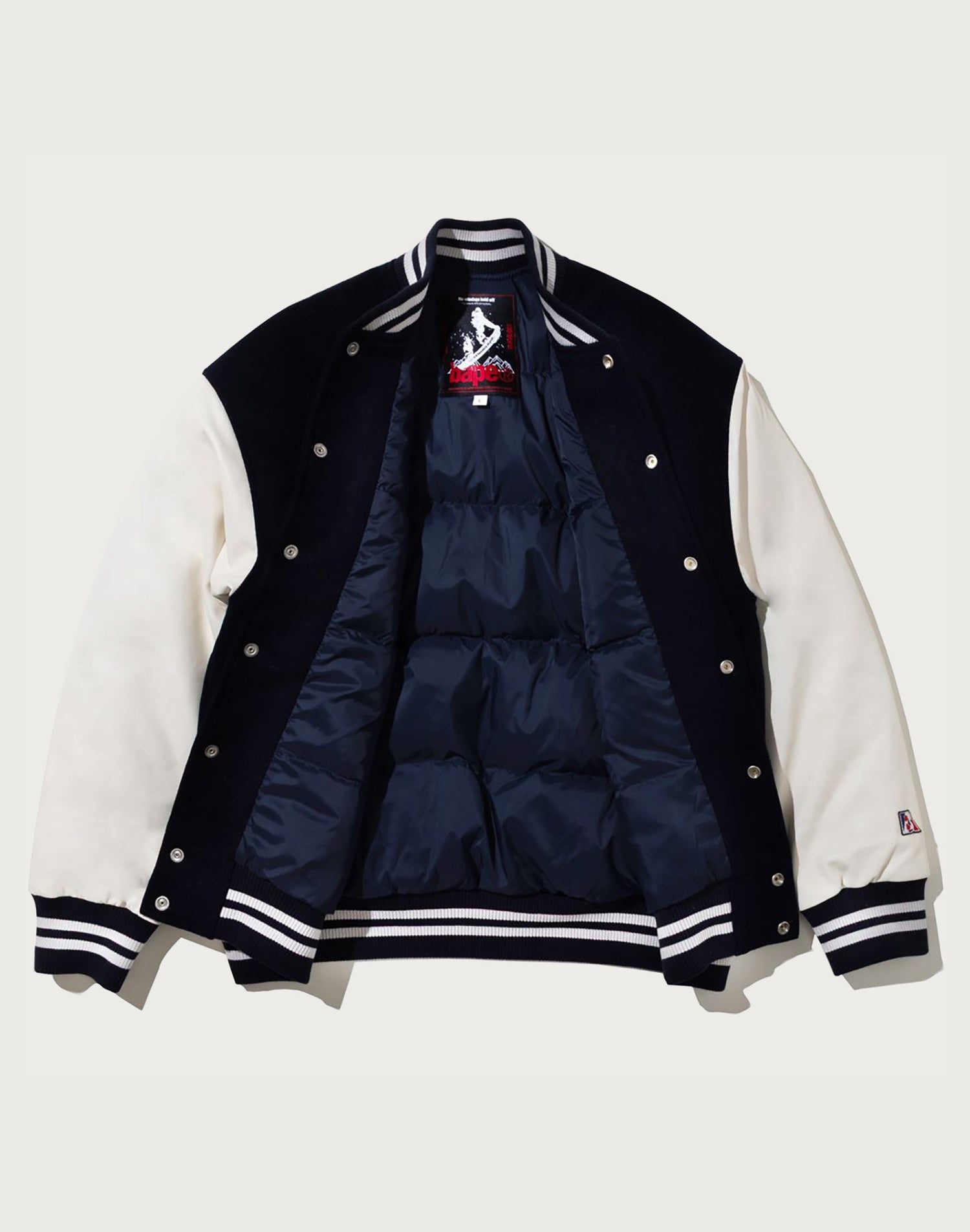 BY KAZUKI KURAISHI MULTI LOGO VARSITY DOWN JACKET MENS