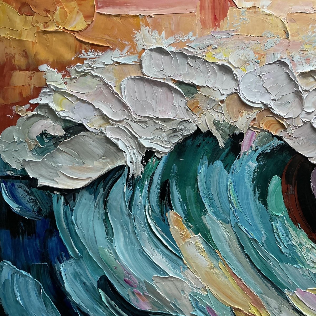 Raised white and teal paint detail in The Painted Wave
