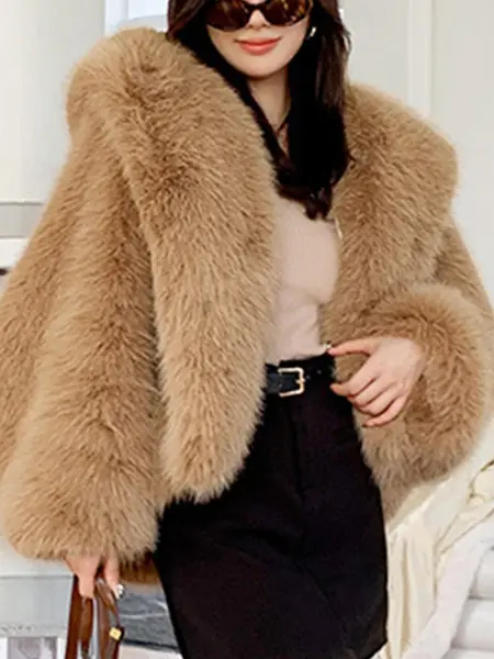 Hooded design with adjustable drawstrings wind protection extra coverage relaxed style faux fur coat