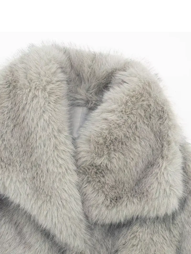 Fitted silhouette faux fur jacket designed to follow your shape tailored cut flatters figure cozy and chic luxurious volume