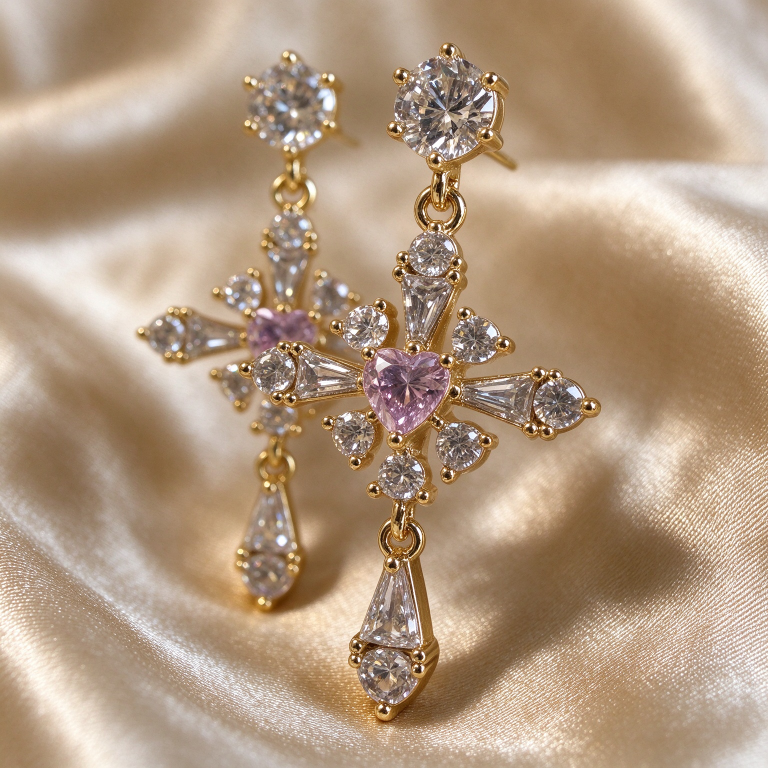 Close up detail of pink cross earrings, central pink gem, diamond cross design, fine jewelry detail shot