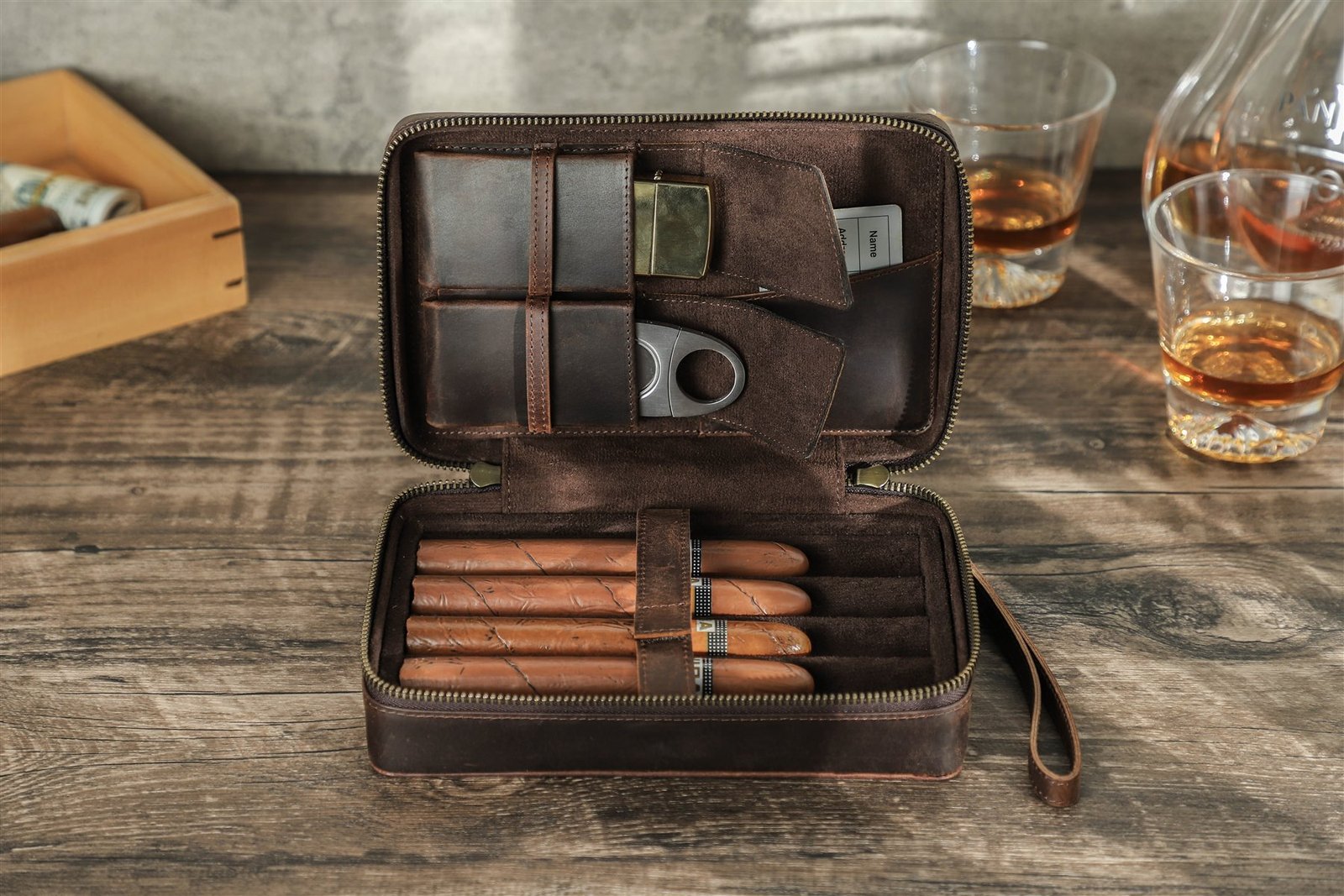 CF5010 4-cigar leather case open on a wooden table with cigars, cutter and lighter