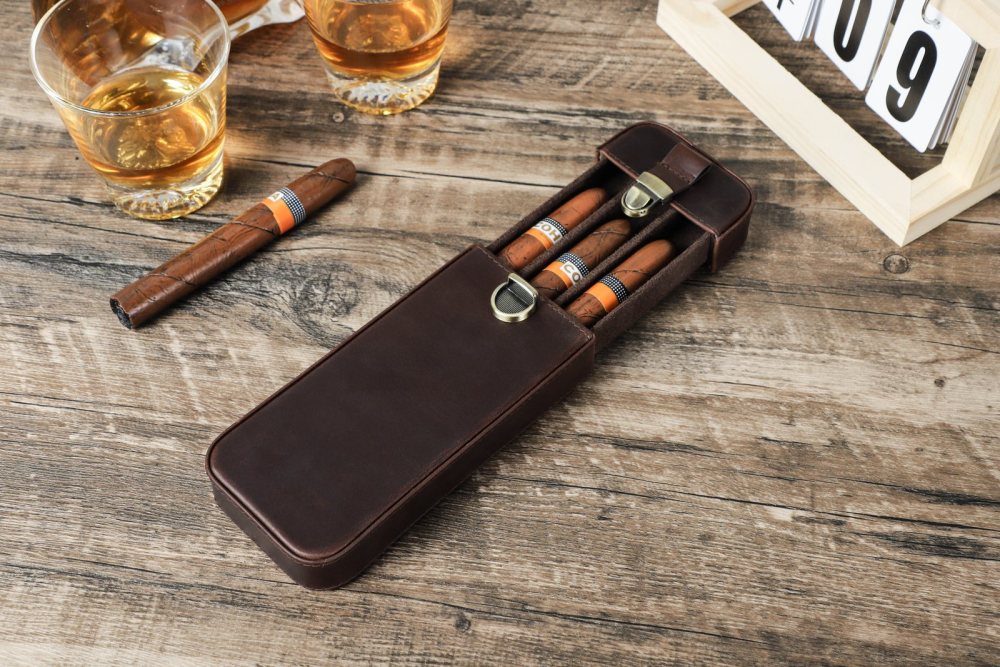 CF5018 with the tray slid halfway out of the sleeve, showing three cigars