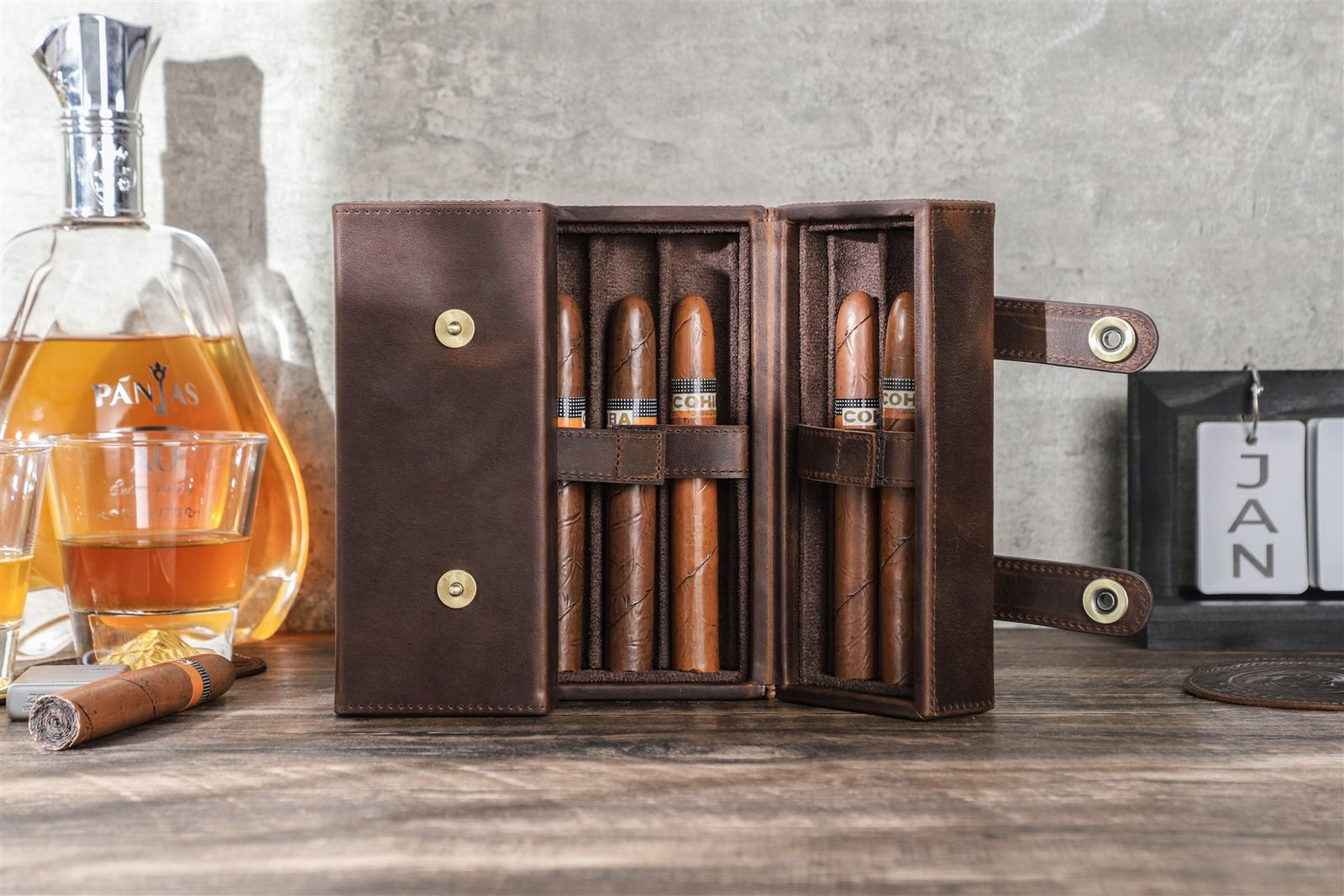 CF5029 cigar box standing open beside a decanter