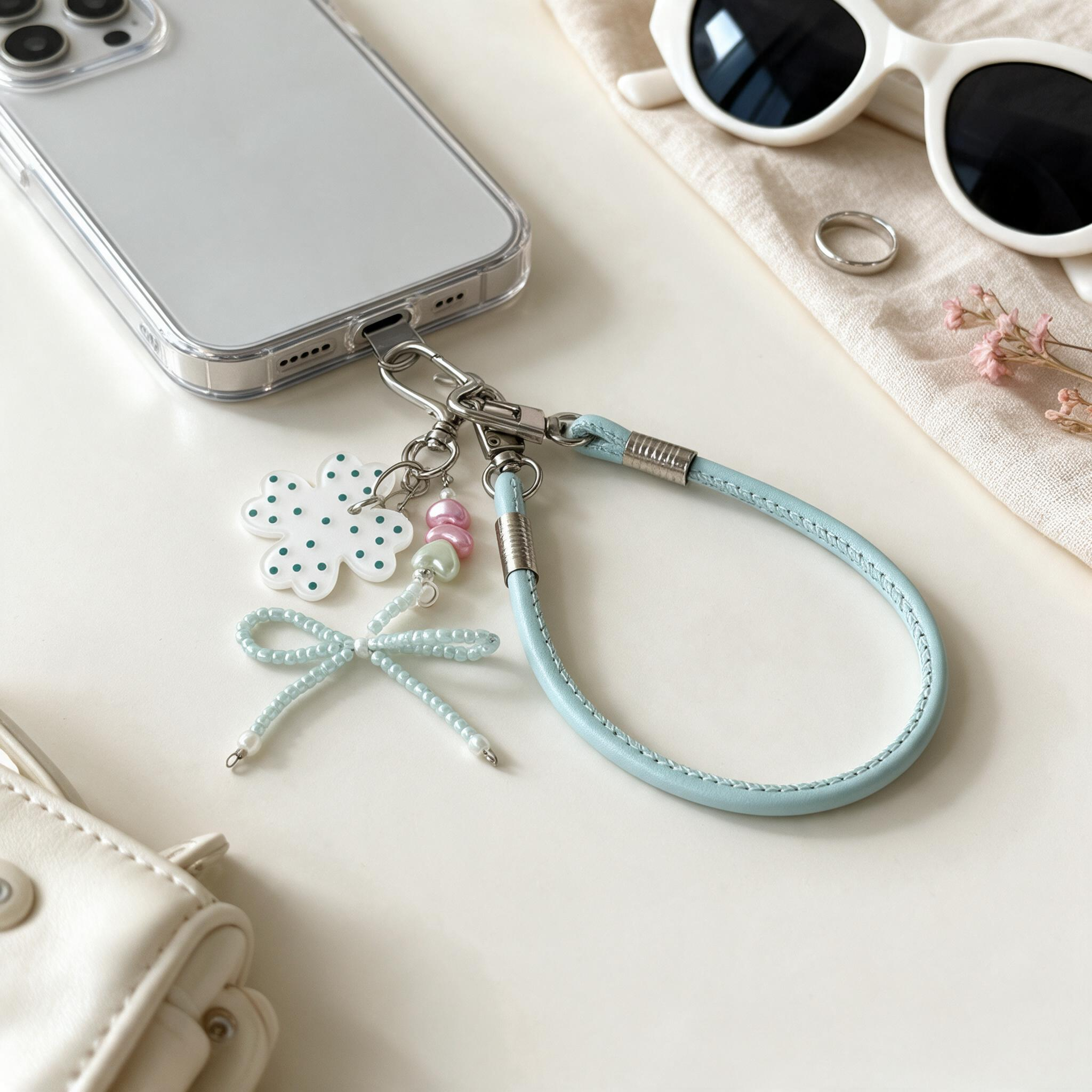 IPHNOE light Blue Leather Phone Wrist Strap With Clover Charm