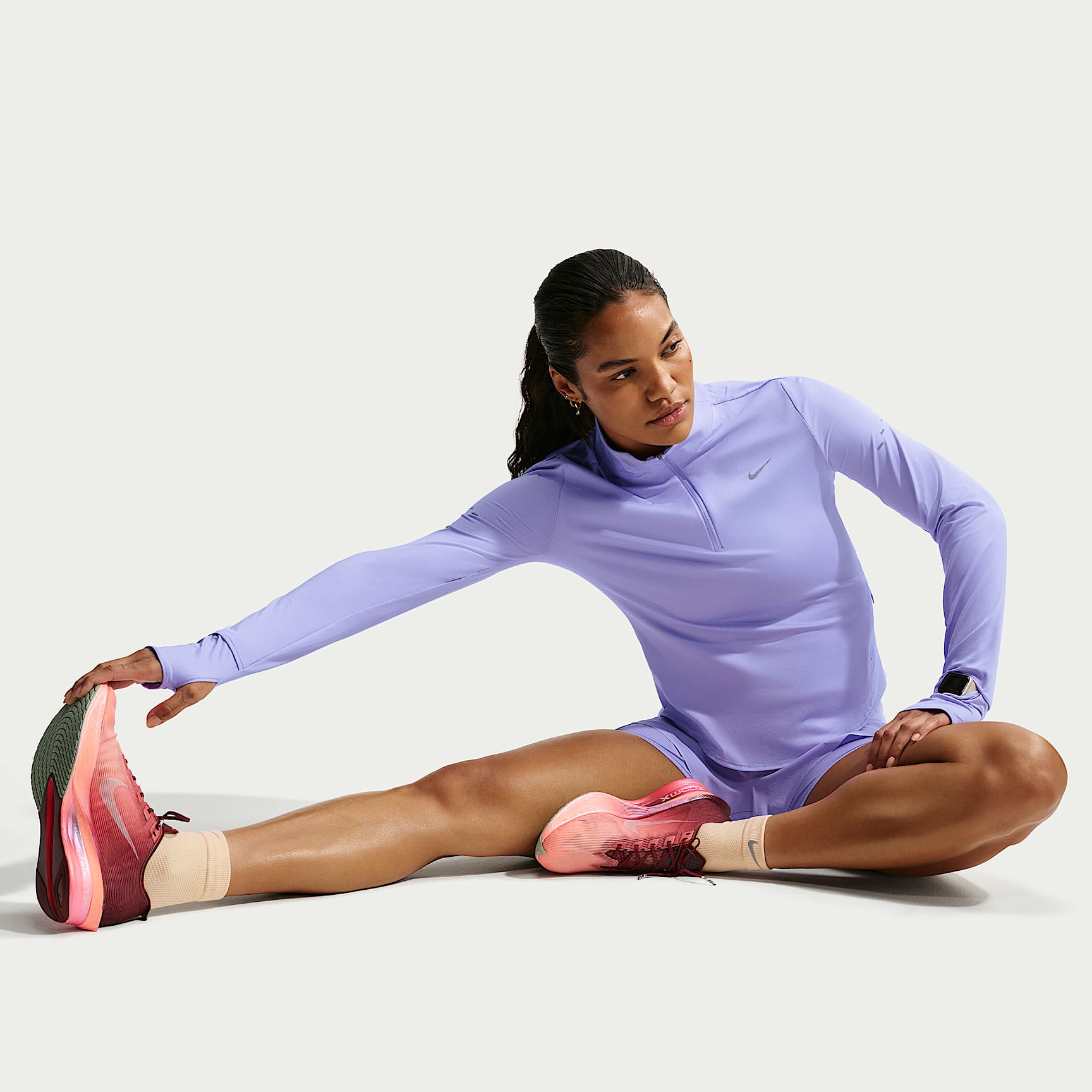 Nike Swift Women's Dri-FIT UV 1/4-Zip Running Top – Purple Pulse