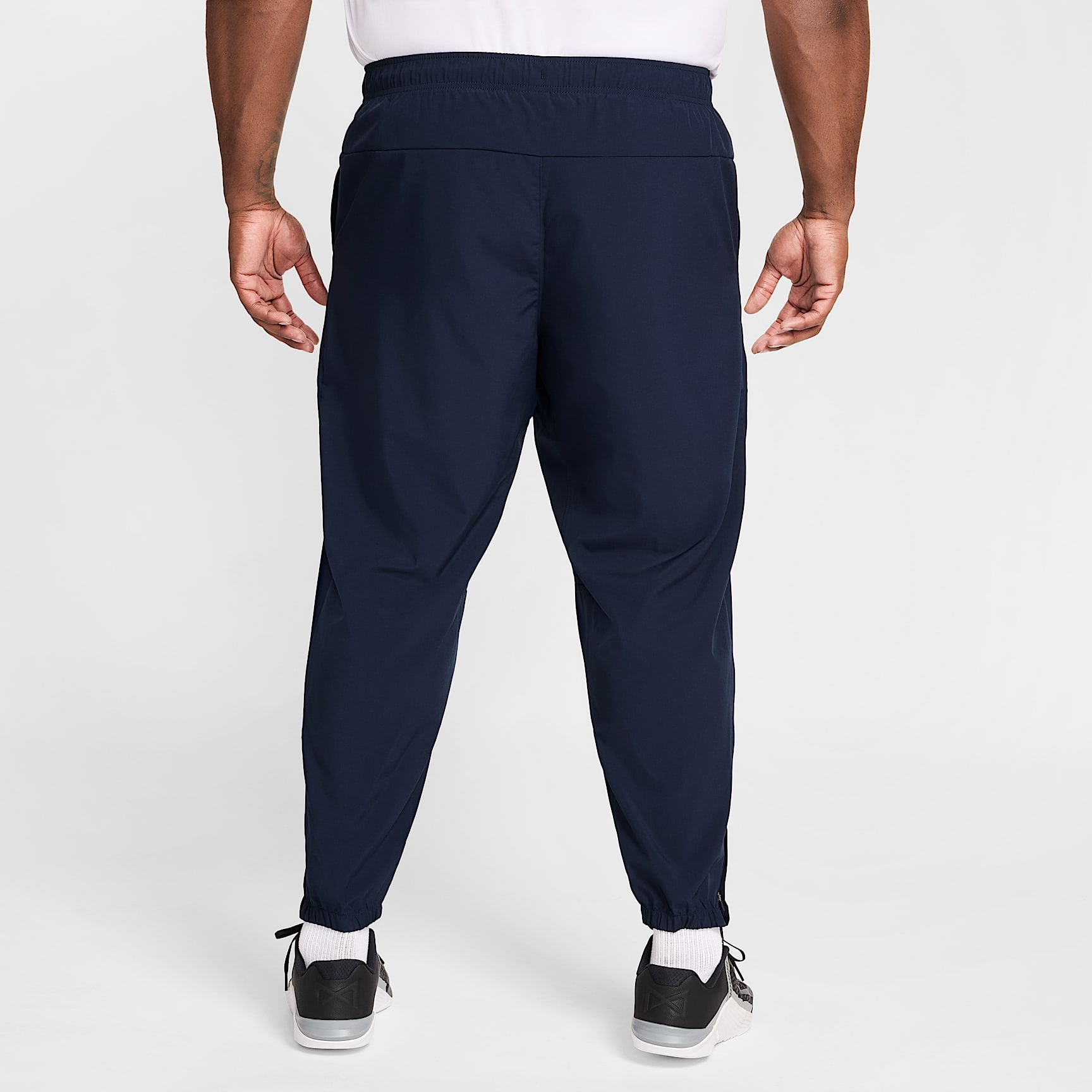 Nike Form Men's Dri-FIT Tapered Versatile Trousers – Obsidian/Black
