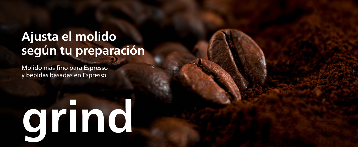 El texto dice «moler». Primer plano de café molido oscuro o sustancia granular similar sobre fondo negro.