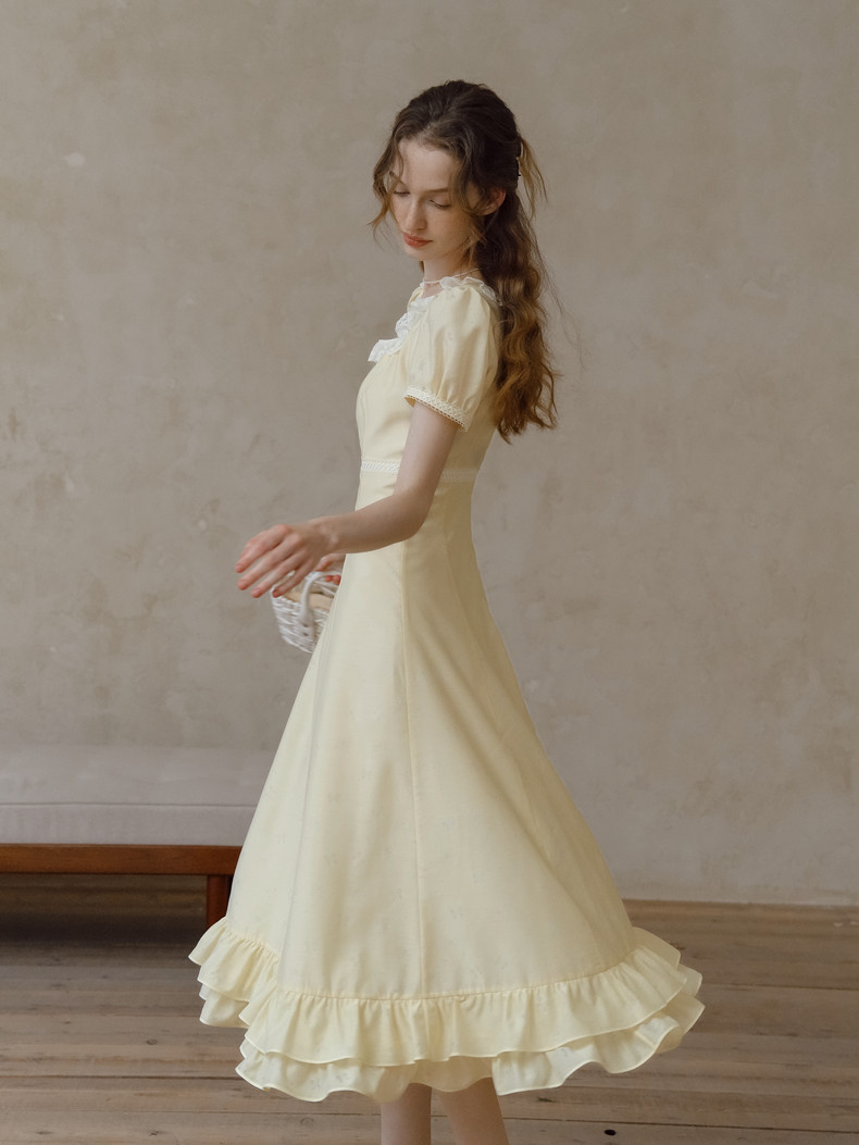 Buy Elegant Pastel Yellow Dress with Lace Neckline & Hem - Megustas
