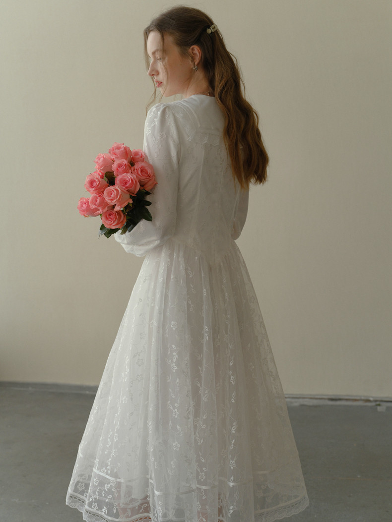 White lace midi dress styled with flowers