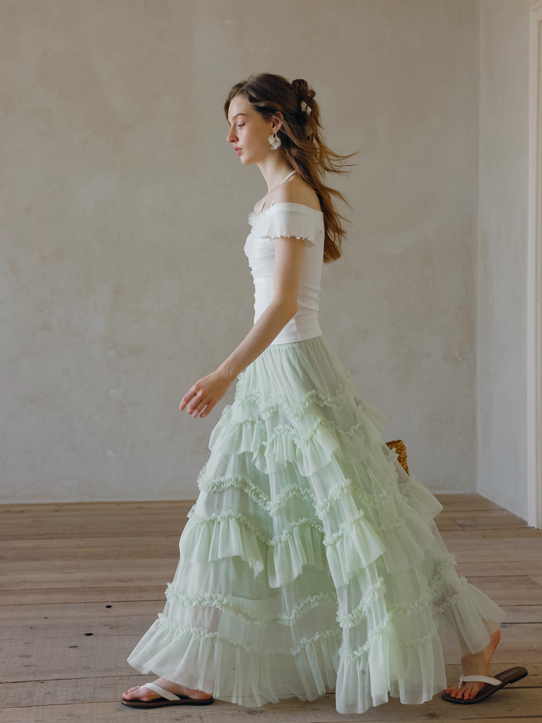 Light green tulle maxi skirt detail