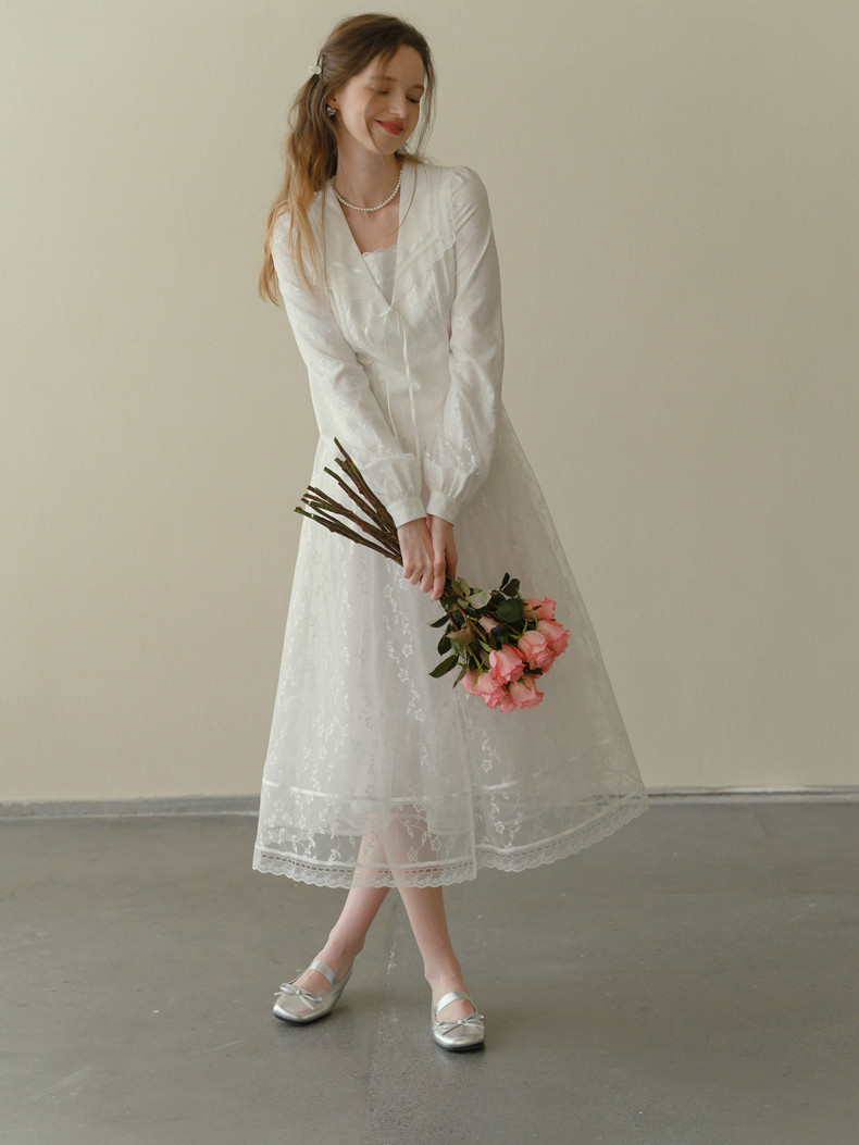 White lace midi dress side view on model