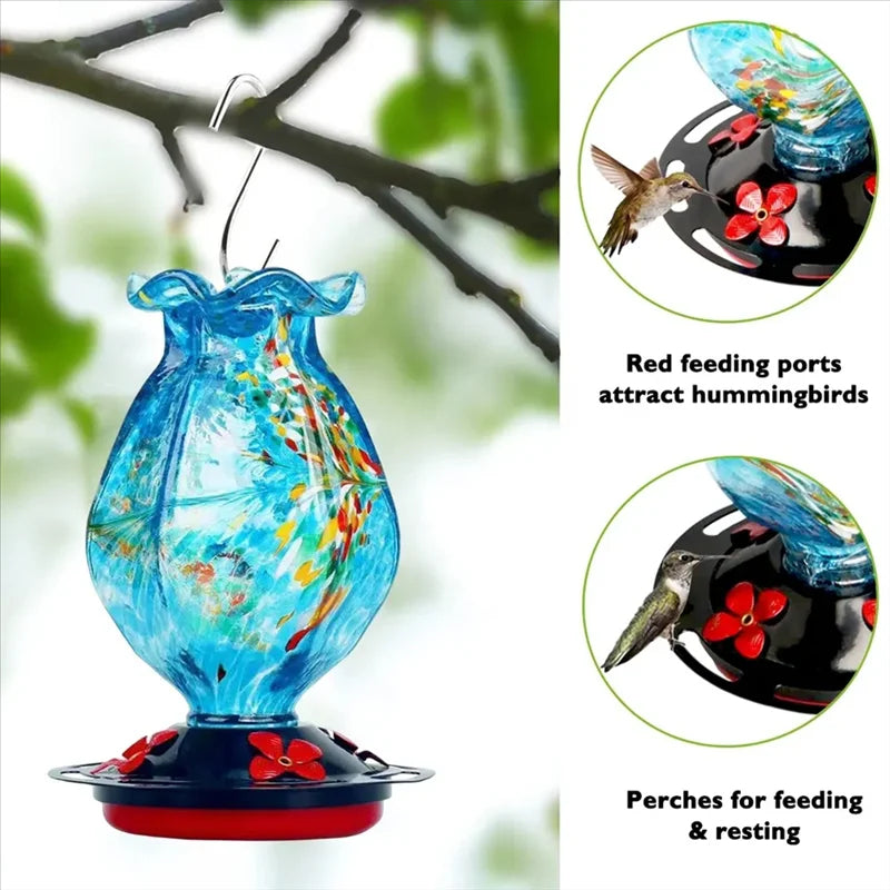 Decorative glass hummingbird feeder hanging in a garden