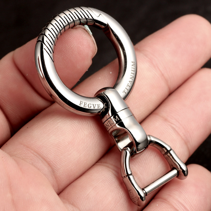 Automotive titanium alloy capsule universal joint keychain, pure titanium universal joint, stainless steel ring, special vehicle modification, rotation